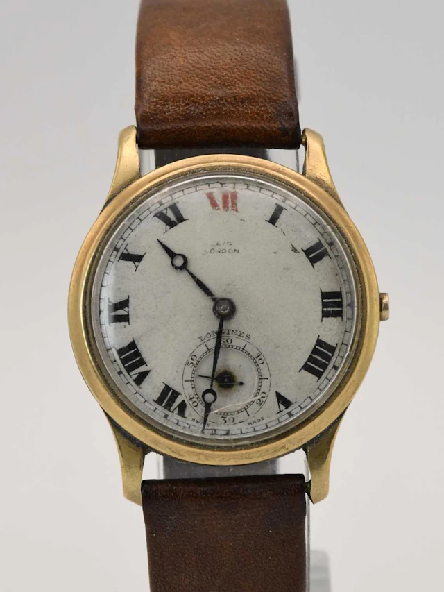 LONGINES: a vintage 9ct yellow gold cased gentleman's wristwatch
