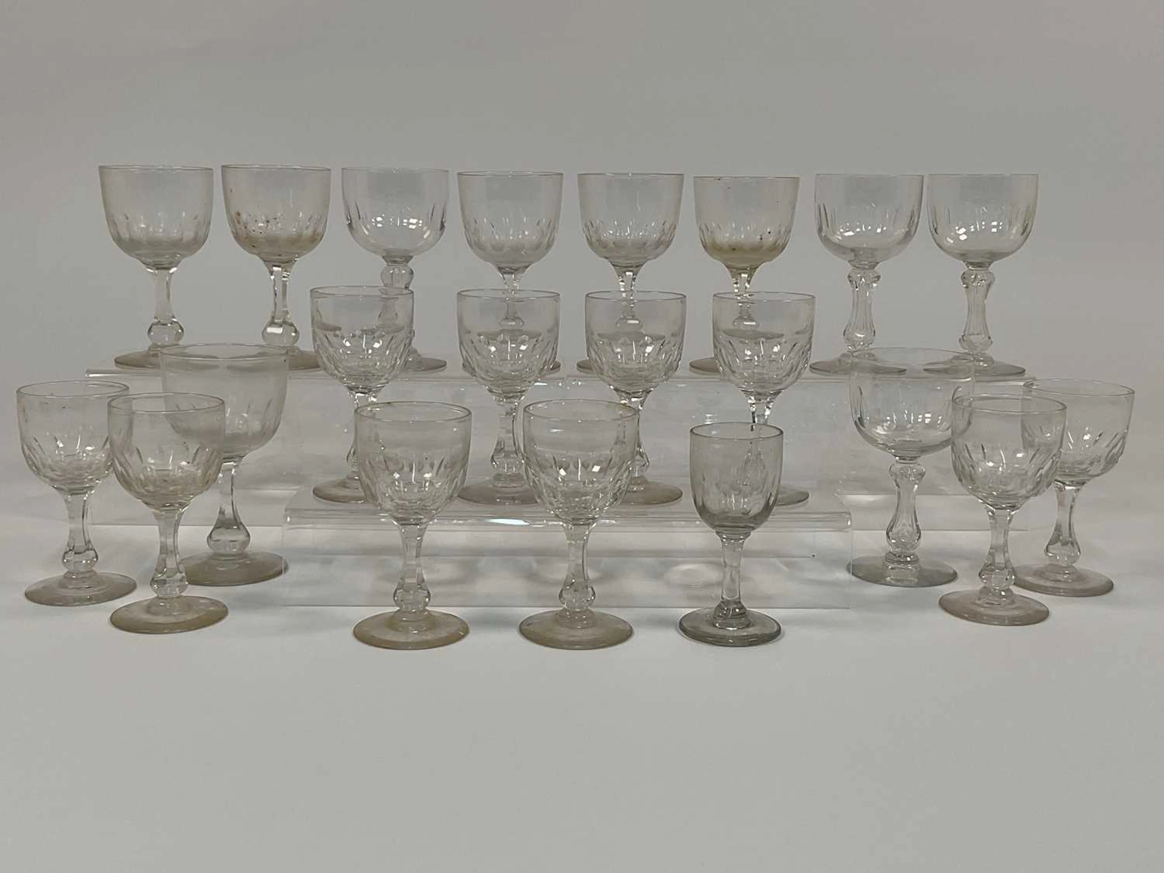 A quantity of 19th century cut glass small wine and port glasses