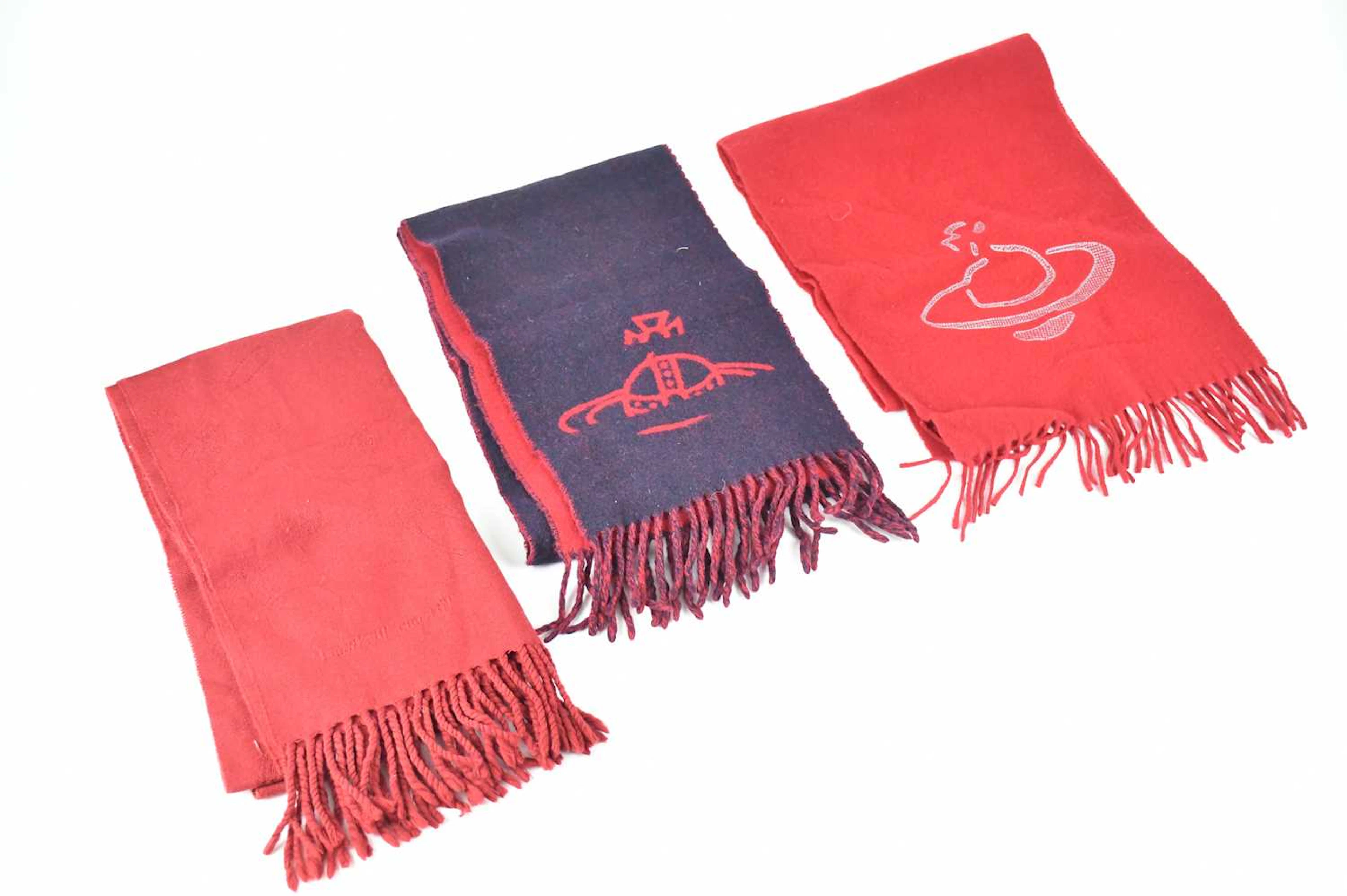 VIVIENNE WESTWOOD; a red wool long rectangular scarf