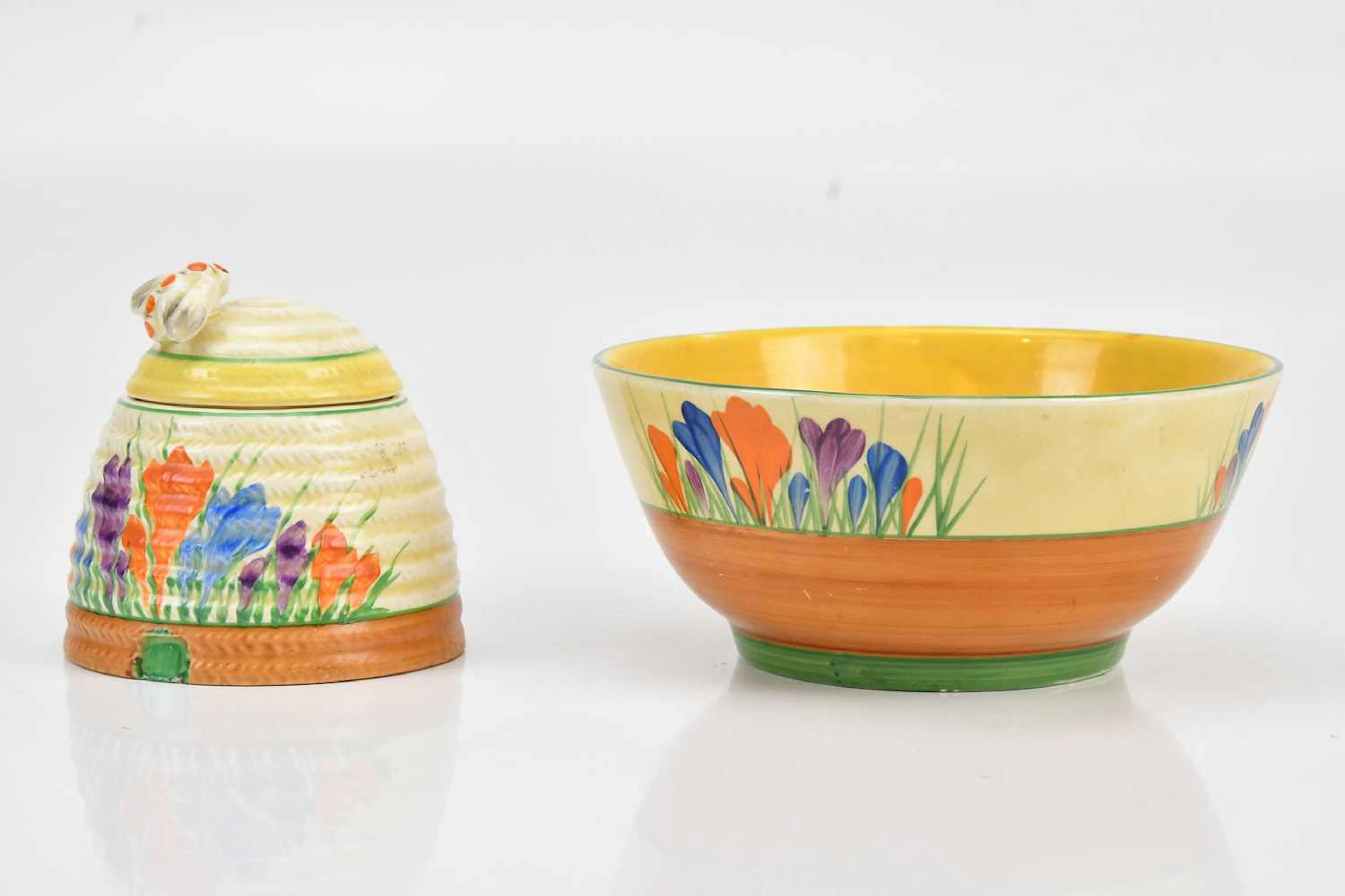 CLARICE CLIFF; a beehive honey pot and cover