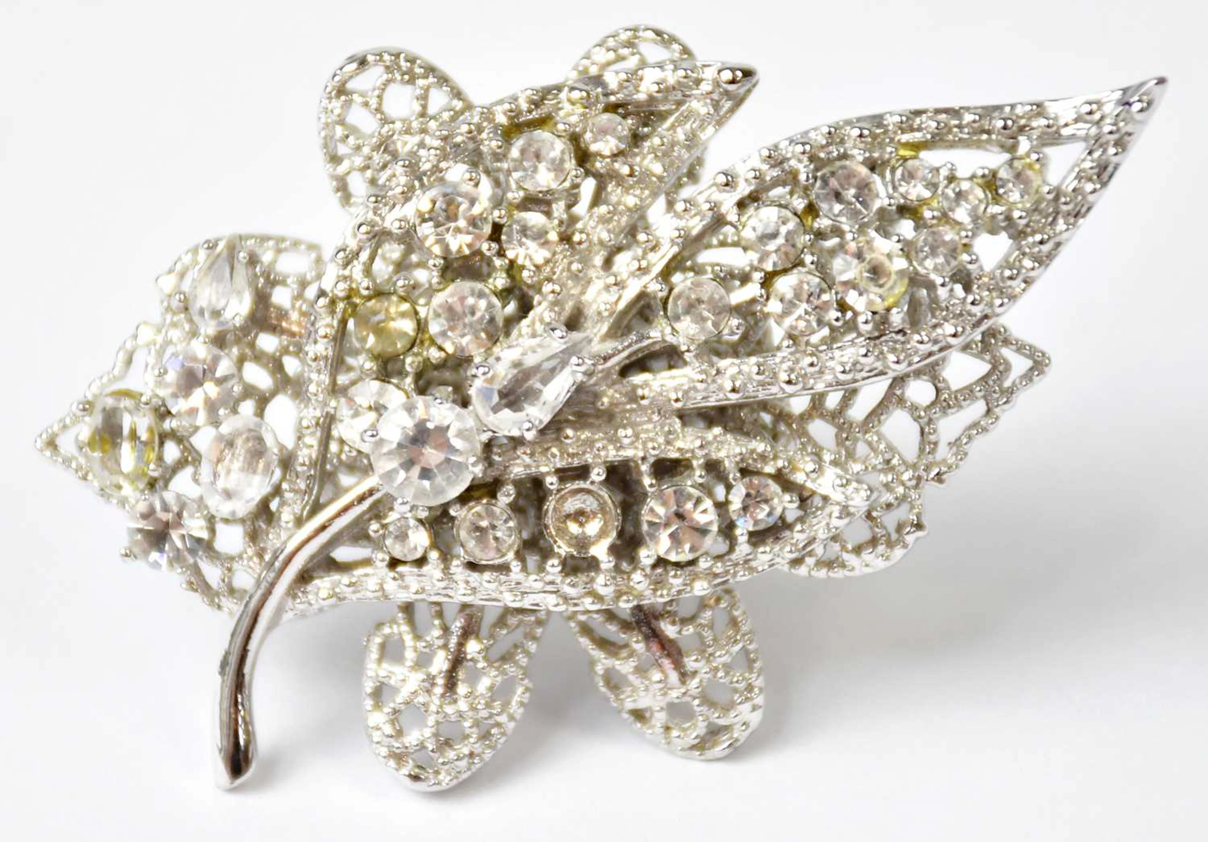 A Margaret Lowe 'Nouveau Leaf' ring set with crystals