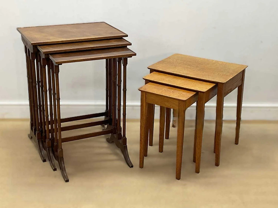 A nest of three mahogany tables
