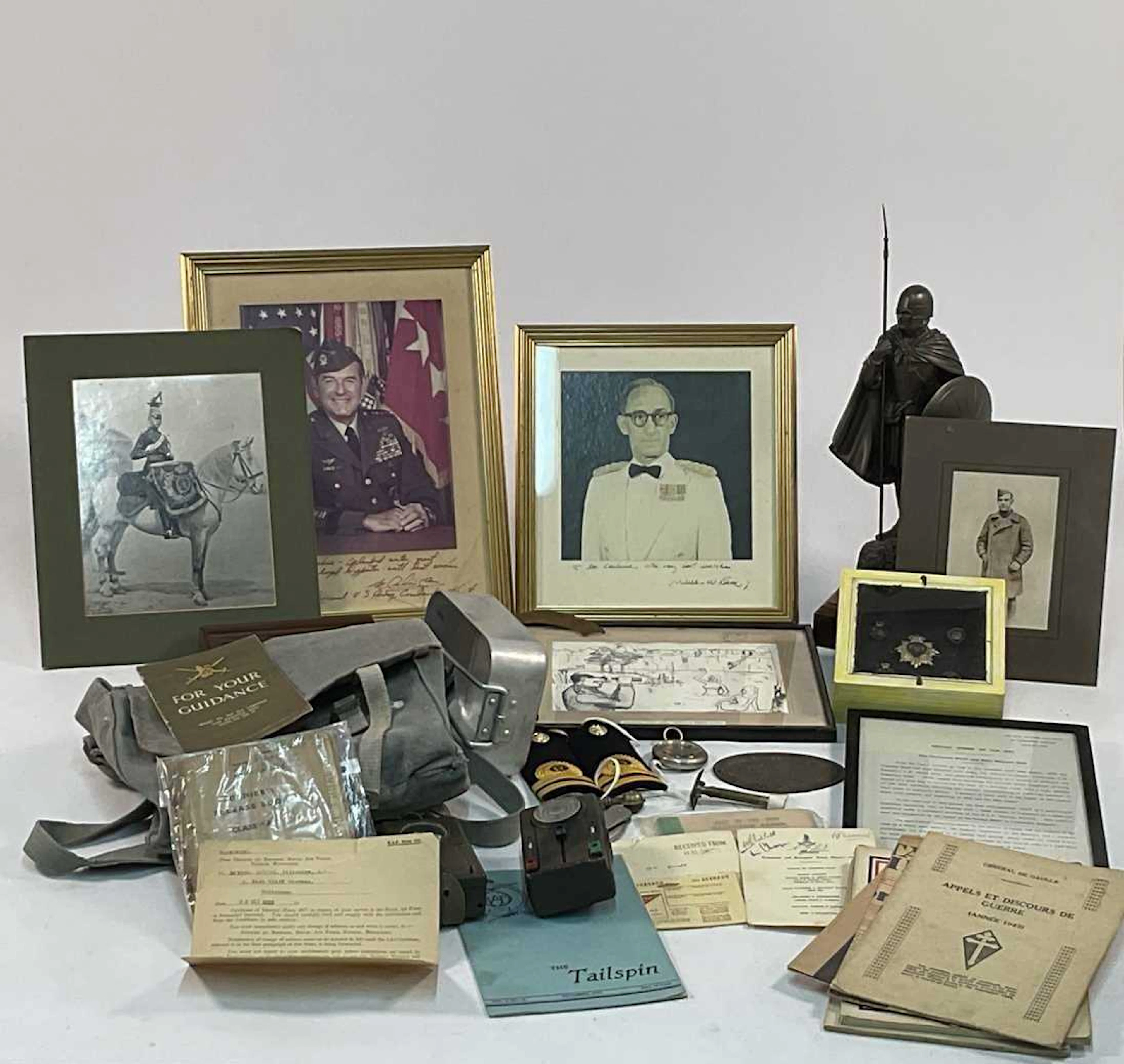 A quantity of military collectibles