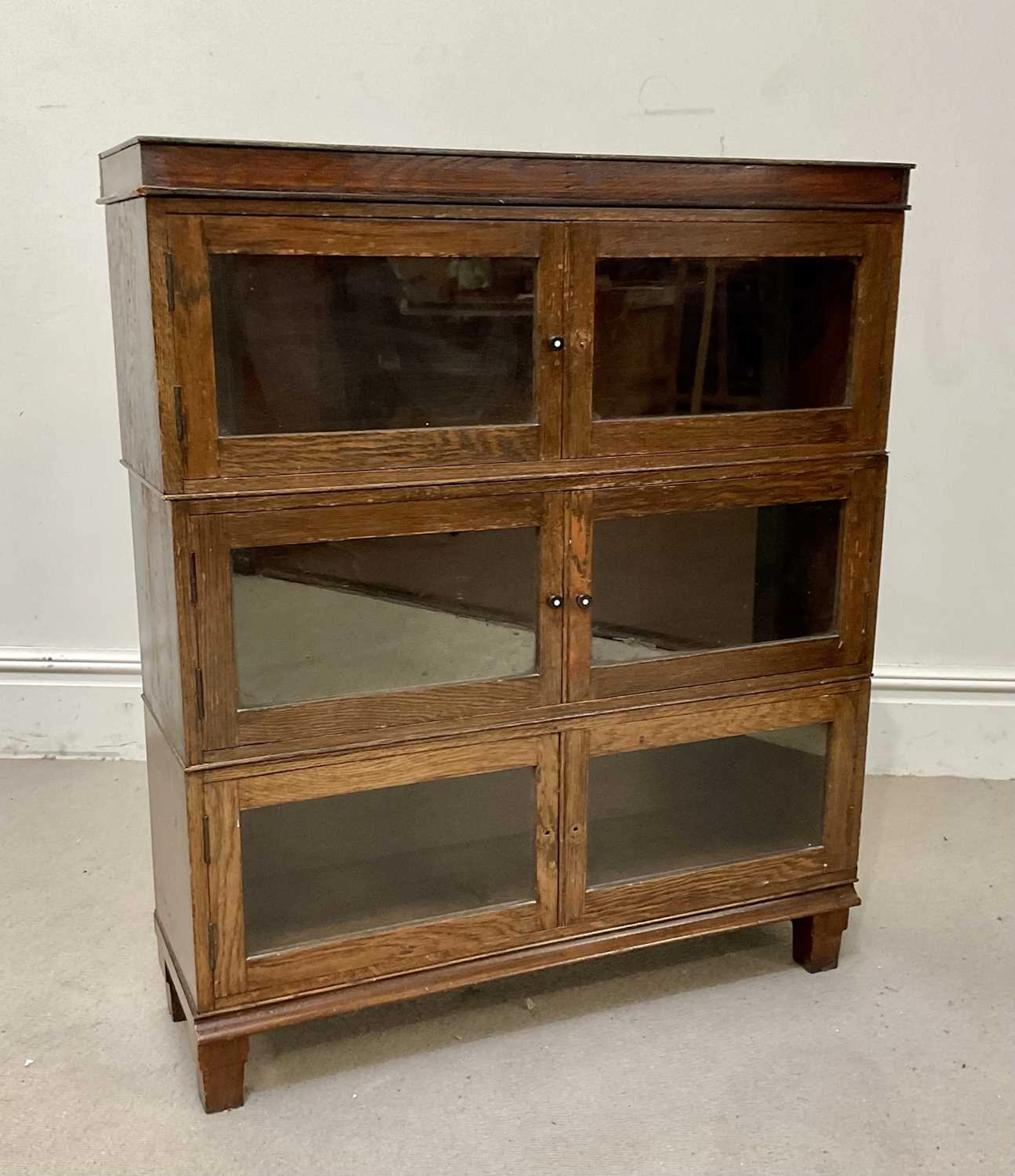 MINTY; an oak three section bookcase