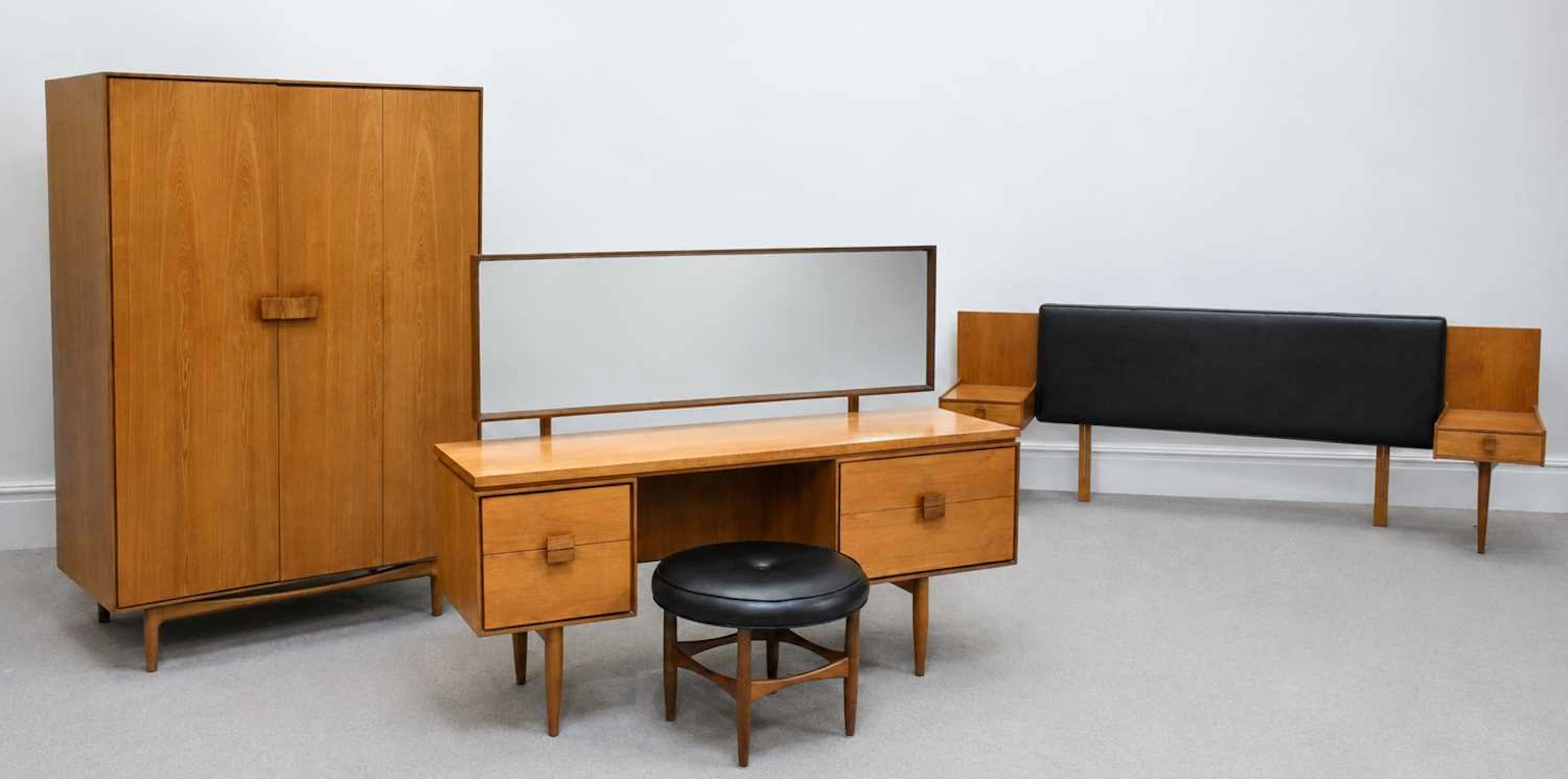 KOFOD LARSEN FOR G PLAN; a teak three piece bedroom suite