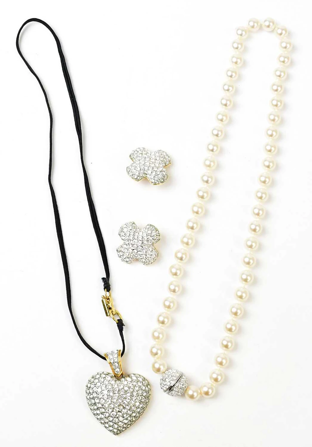 SWAROVSKI; a faux pearl necklace with silver-coloured...