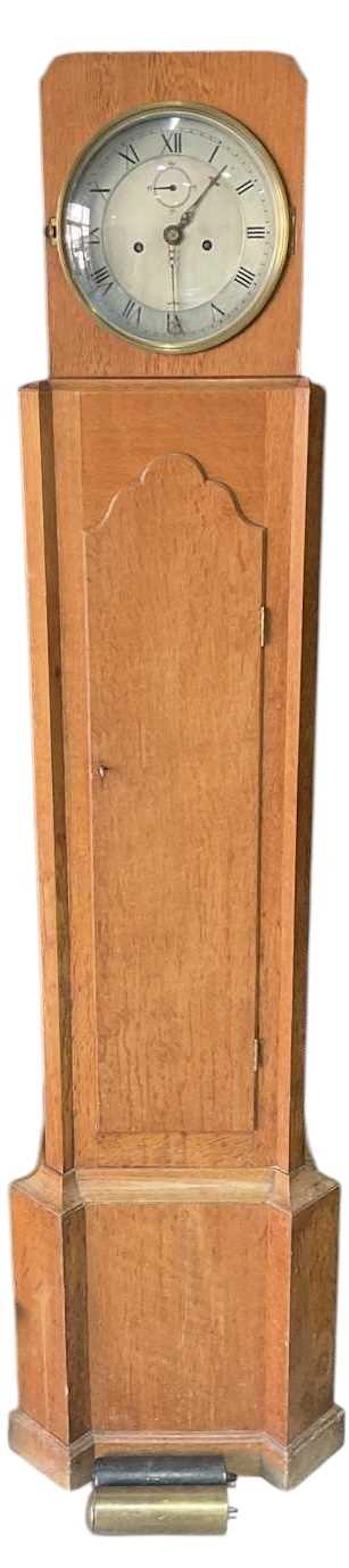 GORDON RUSSELL; an Art Deco oak regulator longcase clock