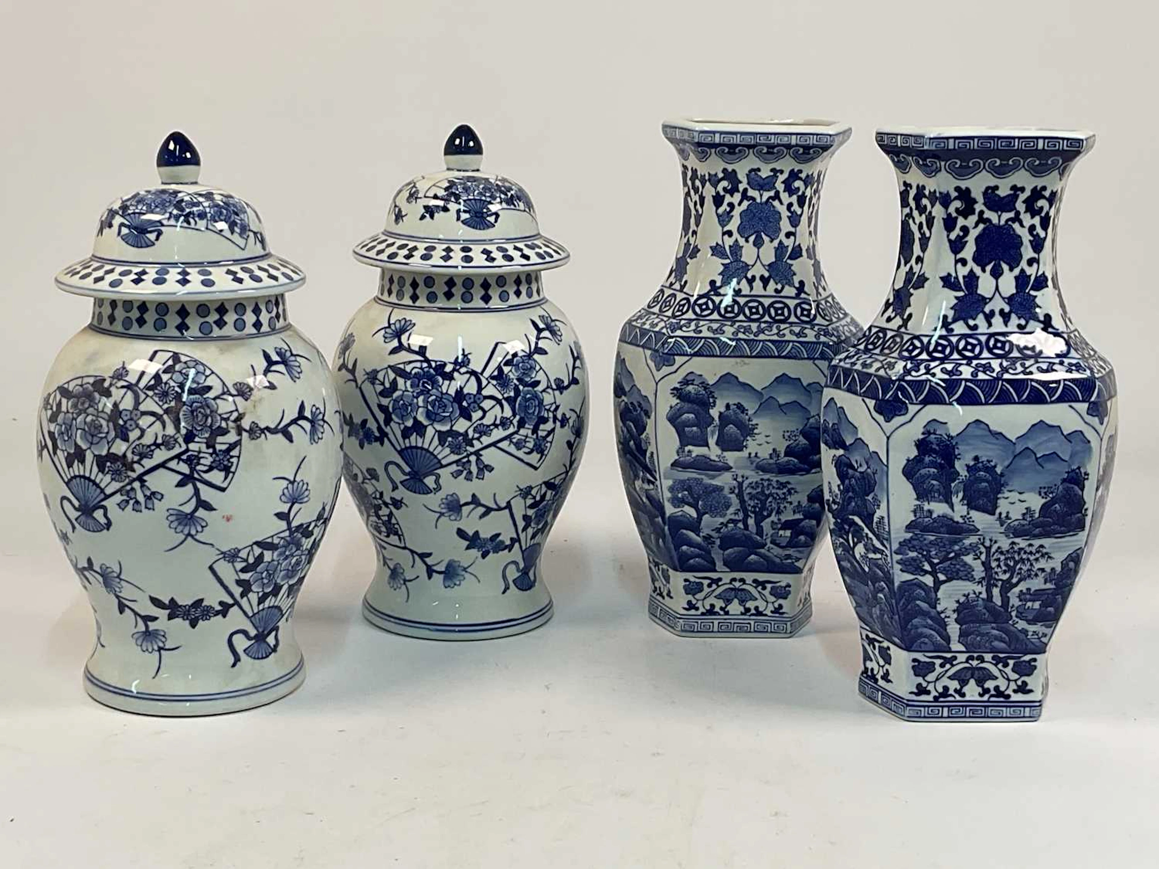 A pair of modern Chinese lidded vases