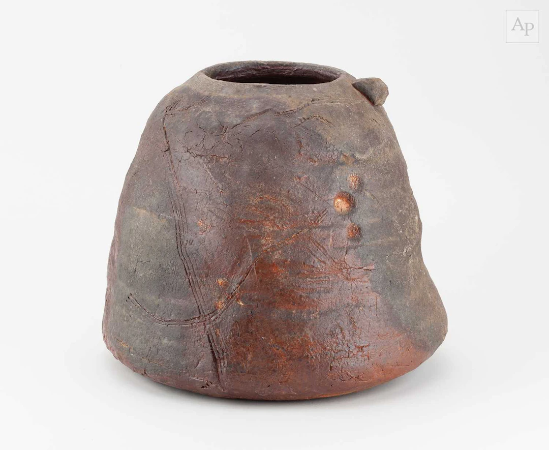 CHARLES BOUND (born 1939); a wood fired stoneware vessel covered in ash glaze