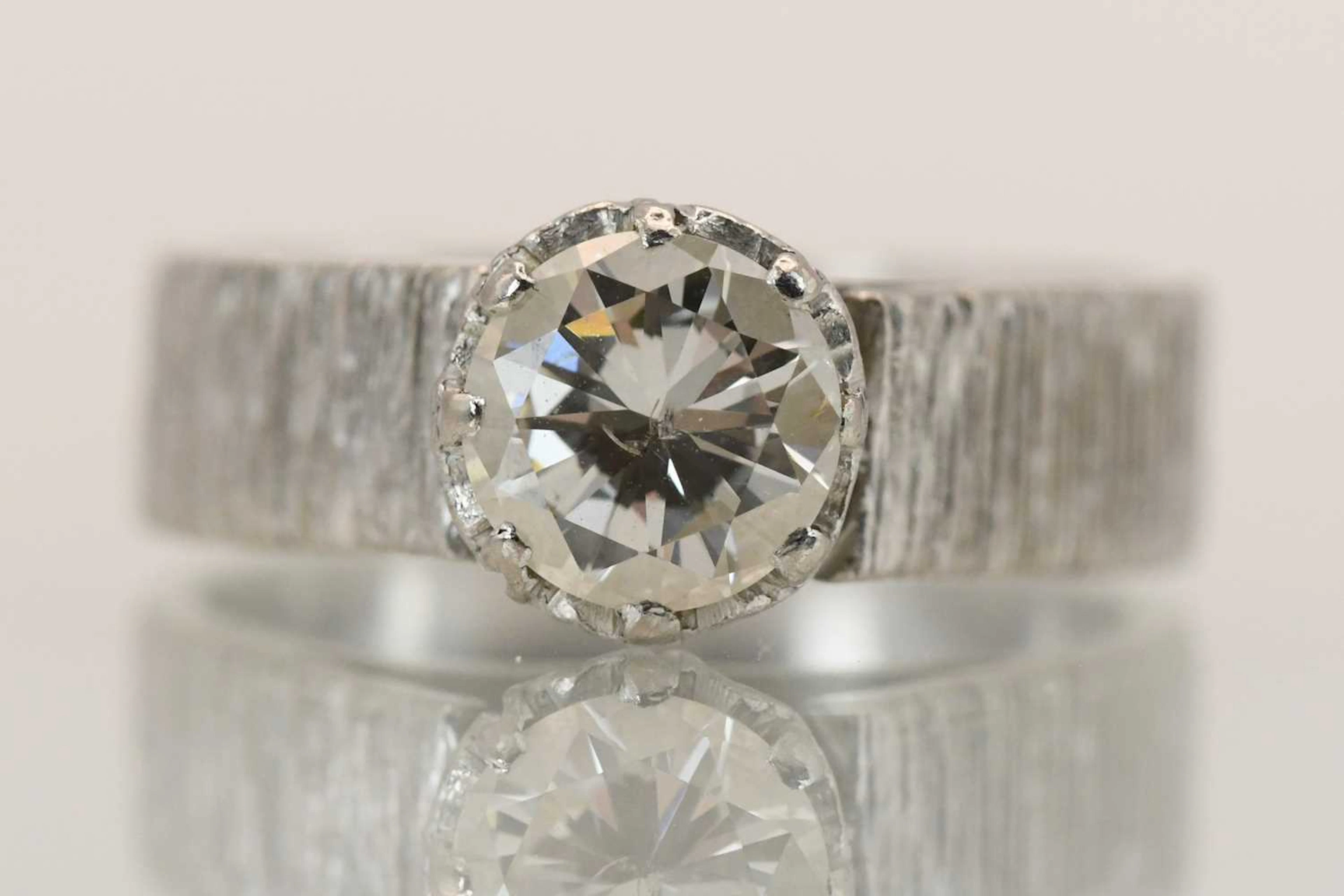 A vintage 1970s 18ct white gold diamond solitaire ring