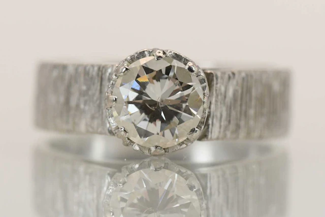 A vintage 1970s 18ct white gold diamond solitaire ring