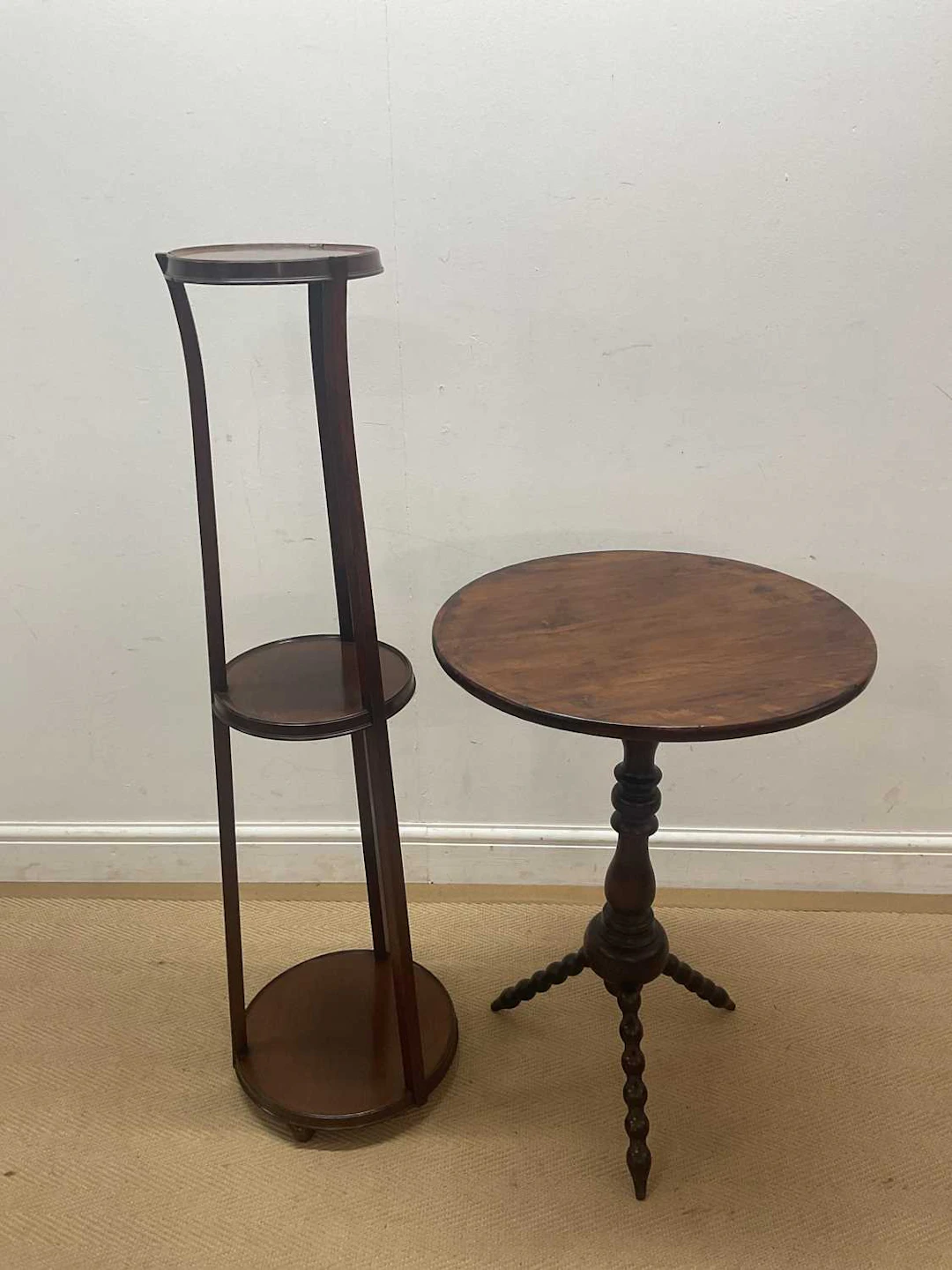 A mahogany gypsy table the top of oval form