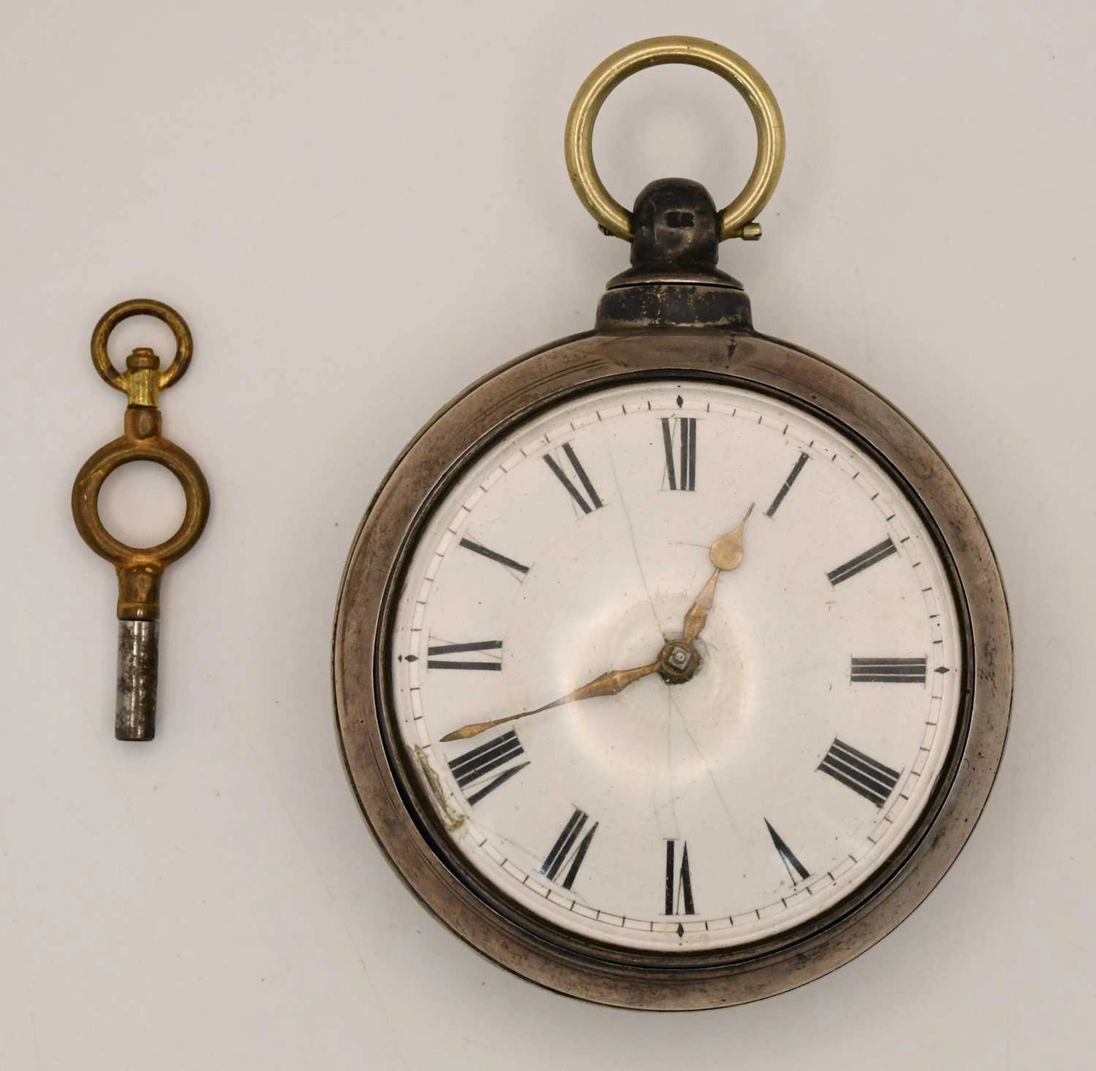 A Victorian hallmarked silver pair cased open face key wind pocket watch