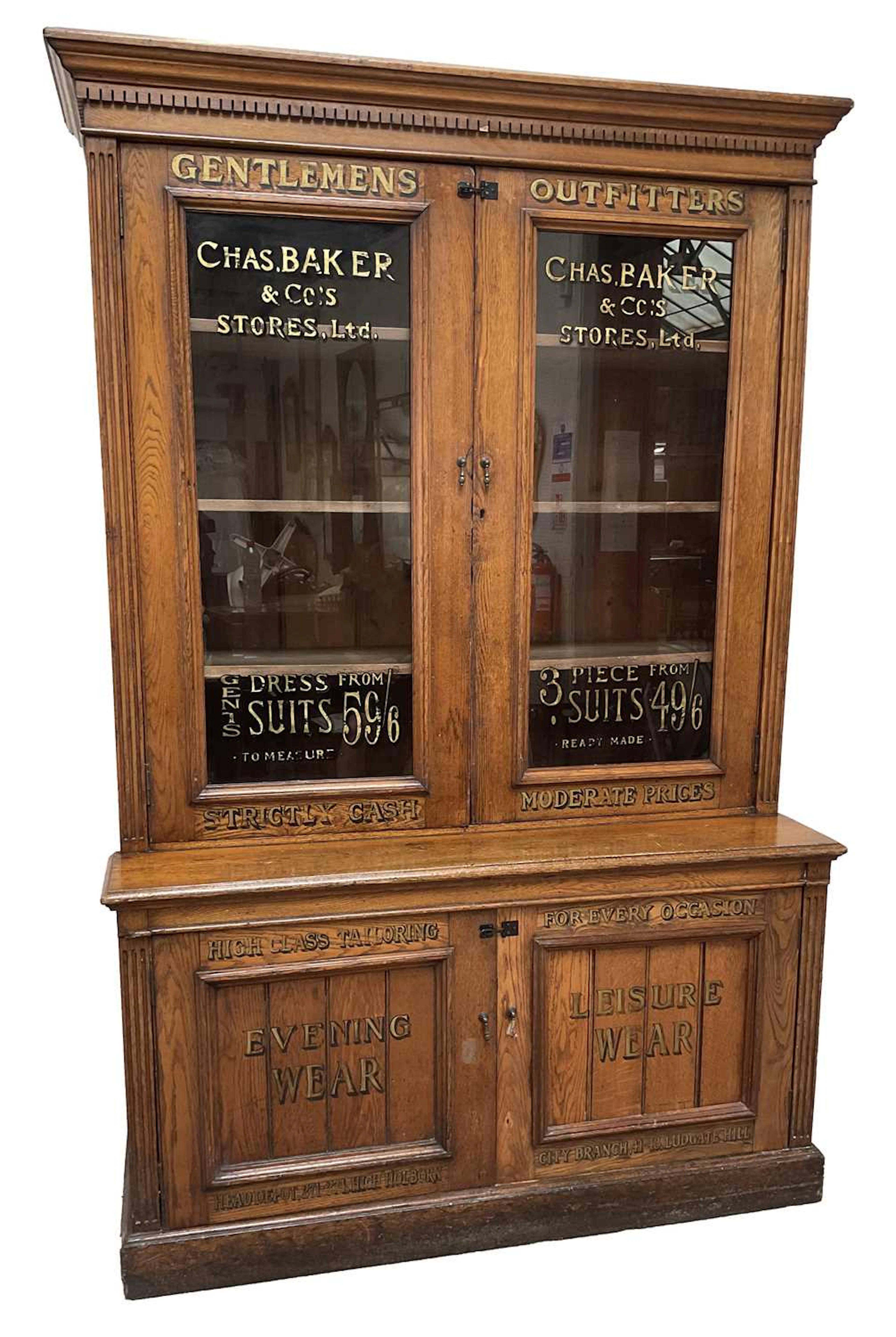 A 19th century oak tailor's cabinet