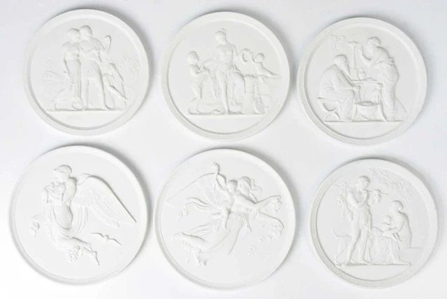 ROYAL COPENHAGEN; six bisque porcelain circular relief...