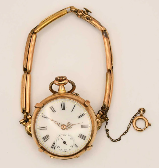 A late 19th/early 20th century 14ct yellow gold cased crown wind fob watch