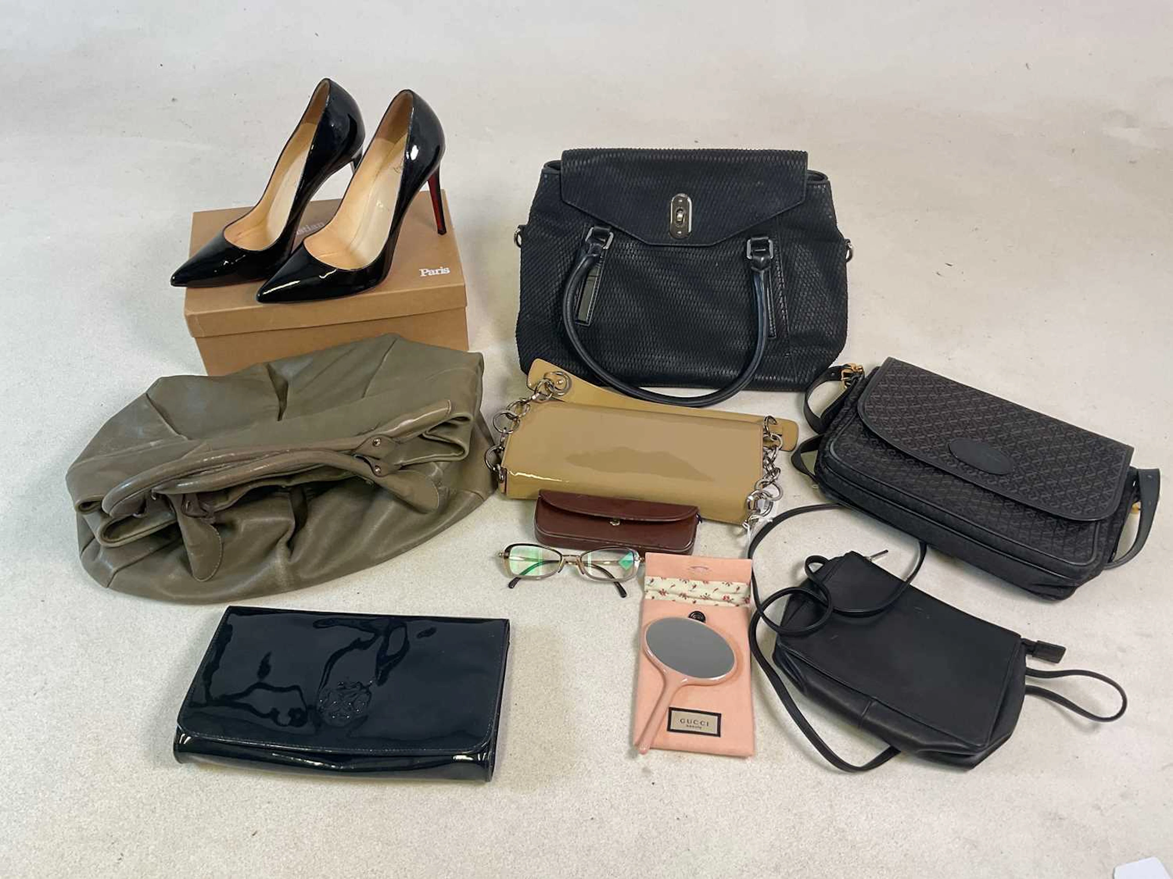 A quantity of designer fashion accessories
