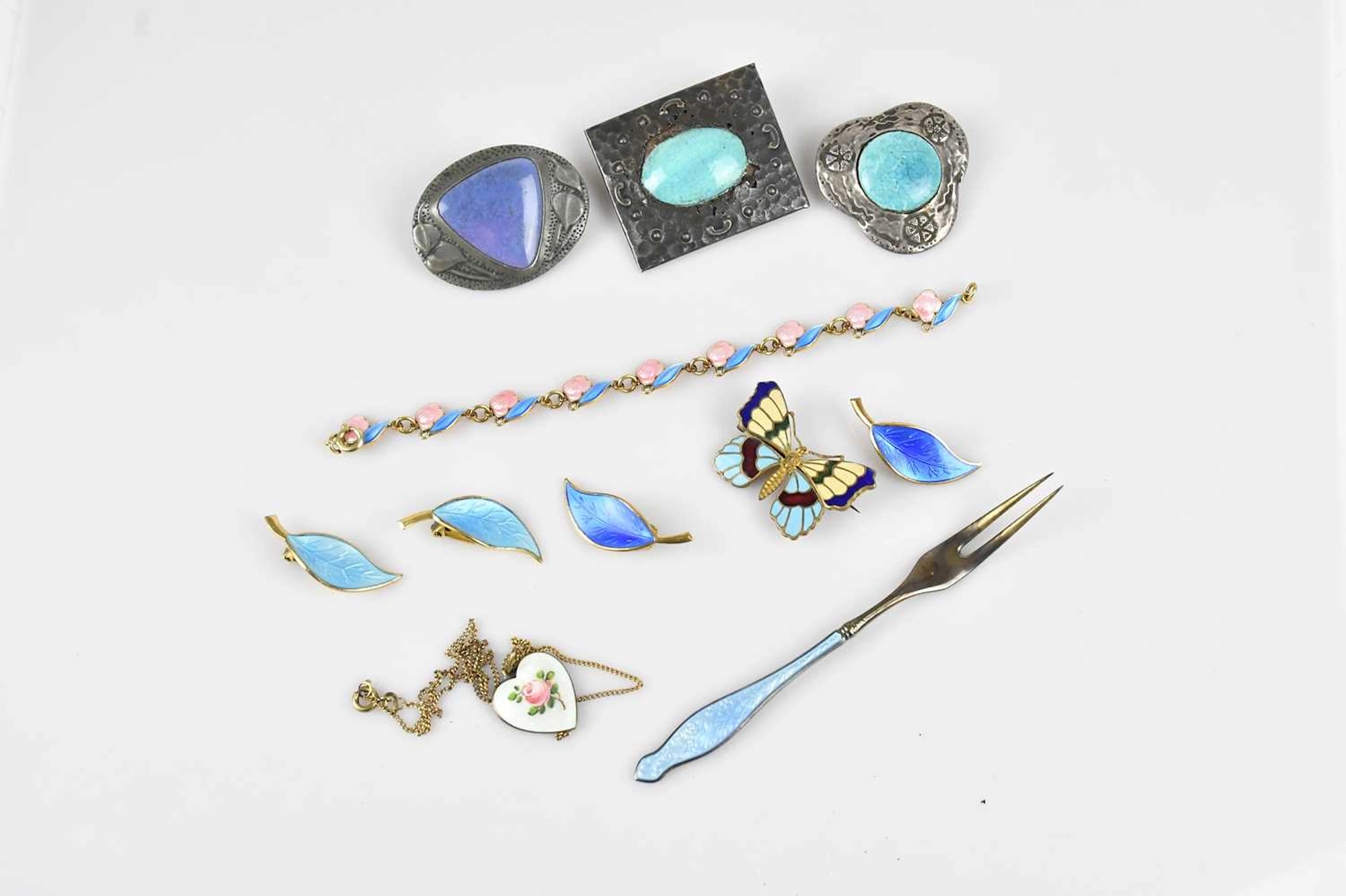 A collection of sterling silver and enamel jewellery