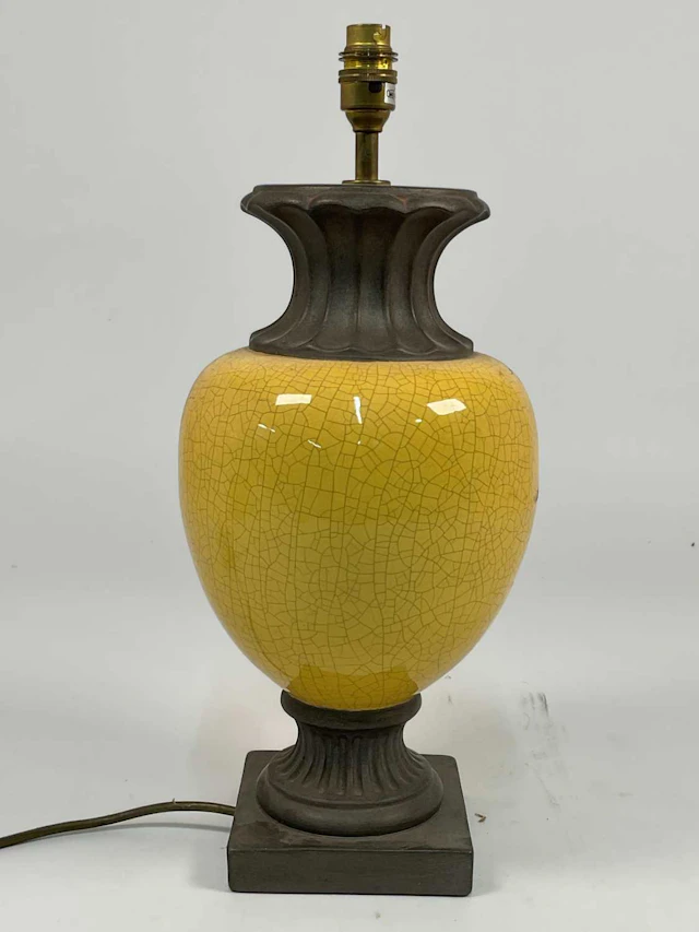 A neoclassical style crackle glazed yellow table lamp