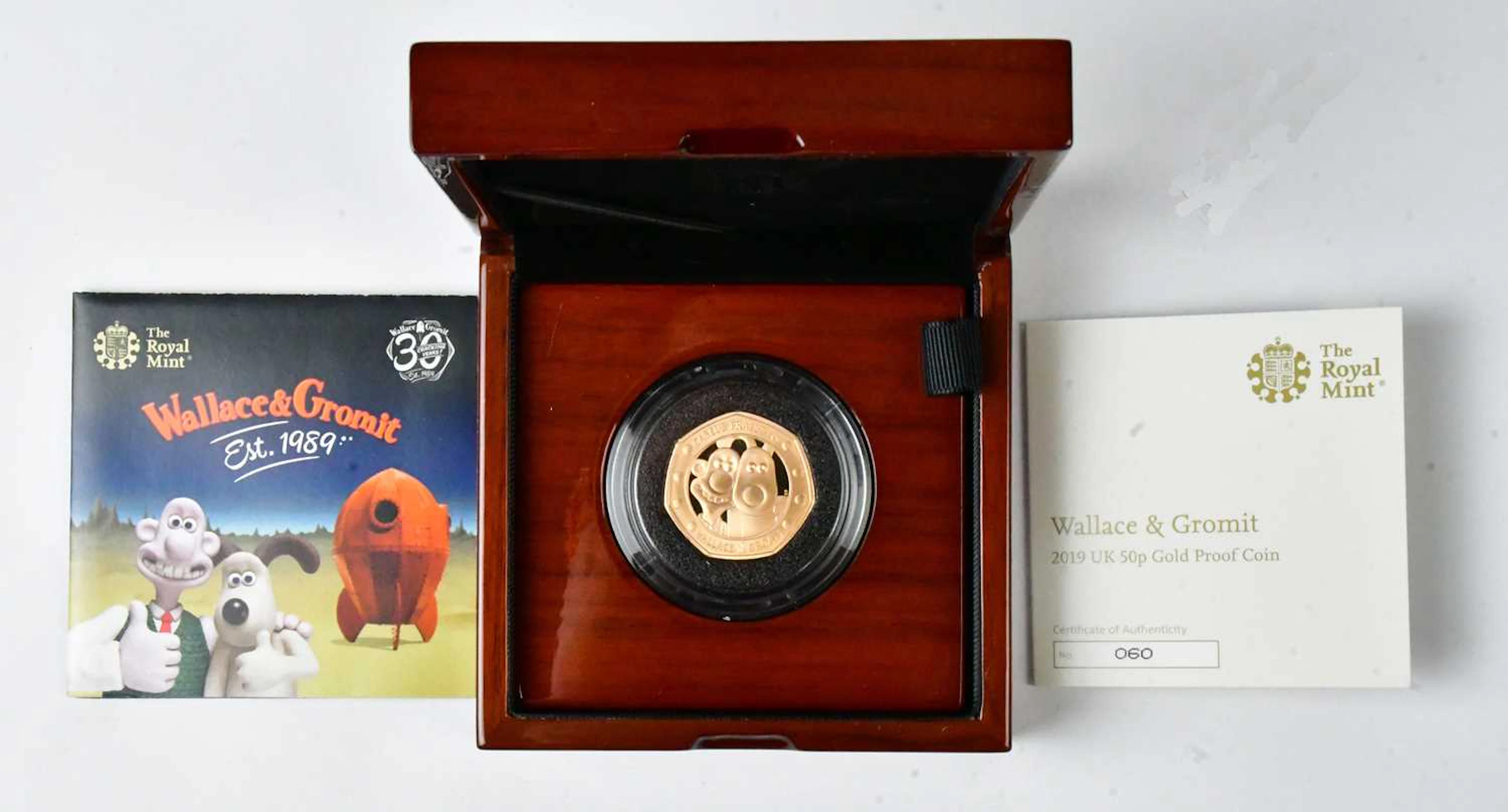THE ROYAL MINT; a Wallace & Gromit commemorative 22ct gold proof 50p coin