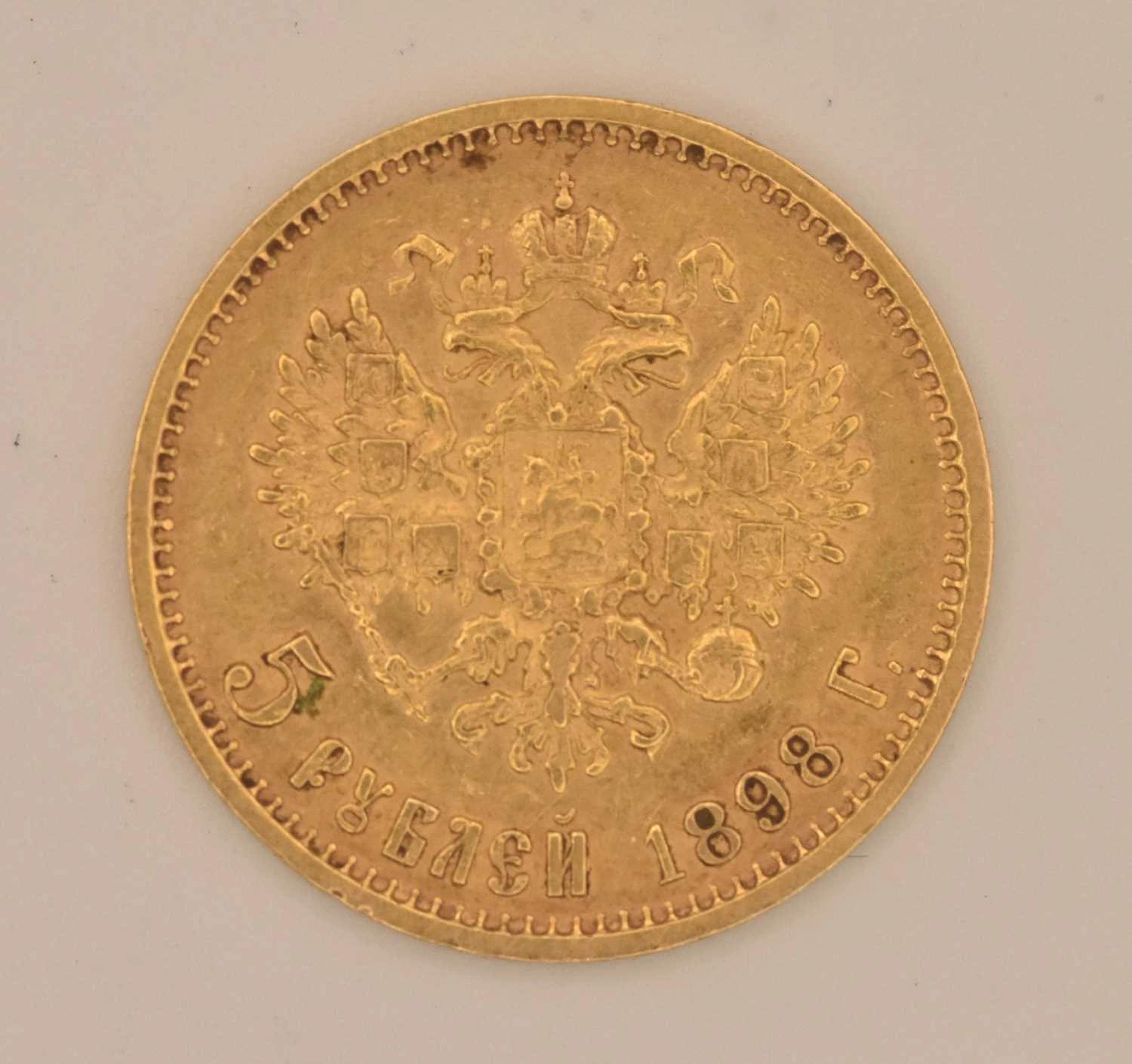 A Russian Nicholas II five rouble coin