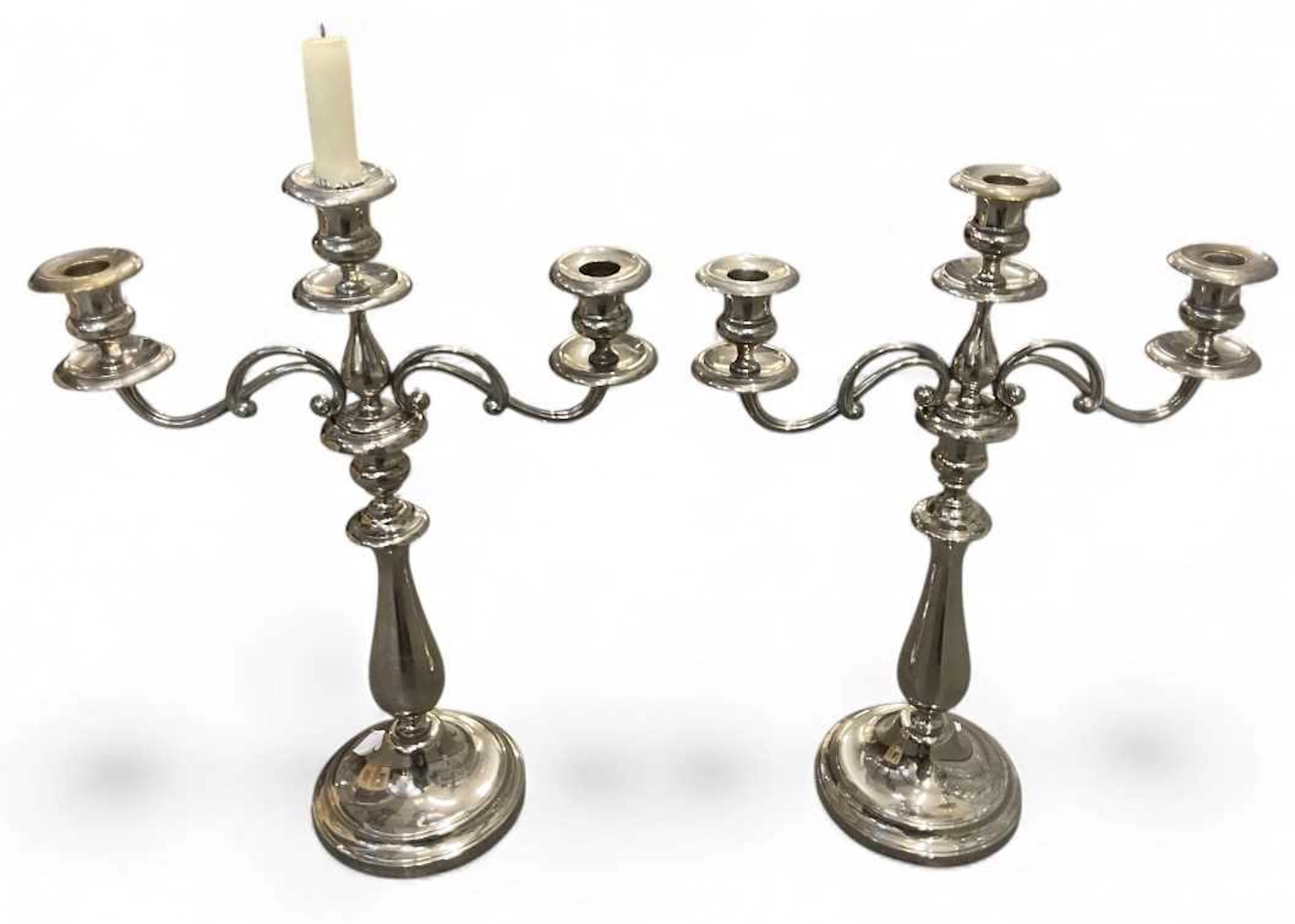 CHRISTOFLE; a pair of modern contemporary silver plated three branch candelabra