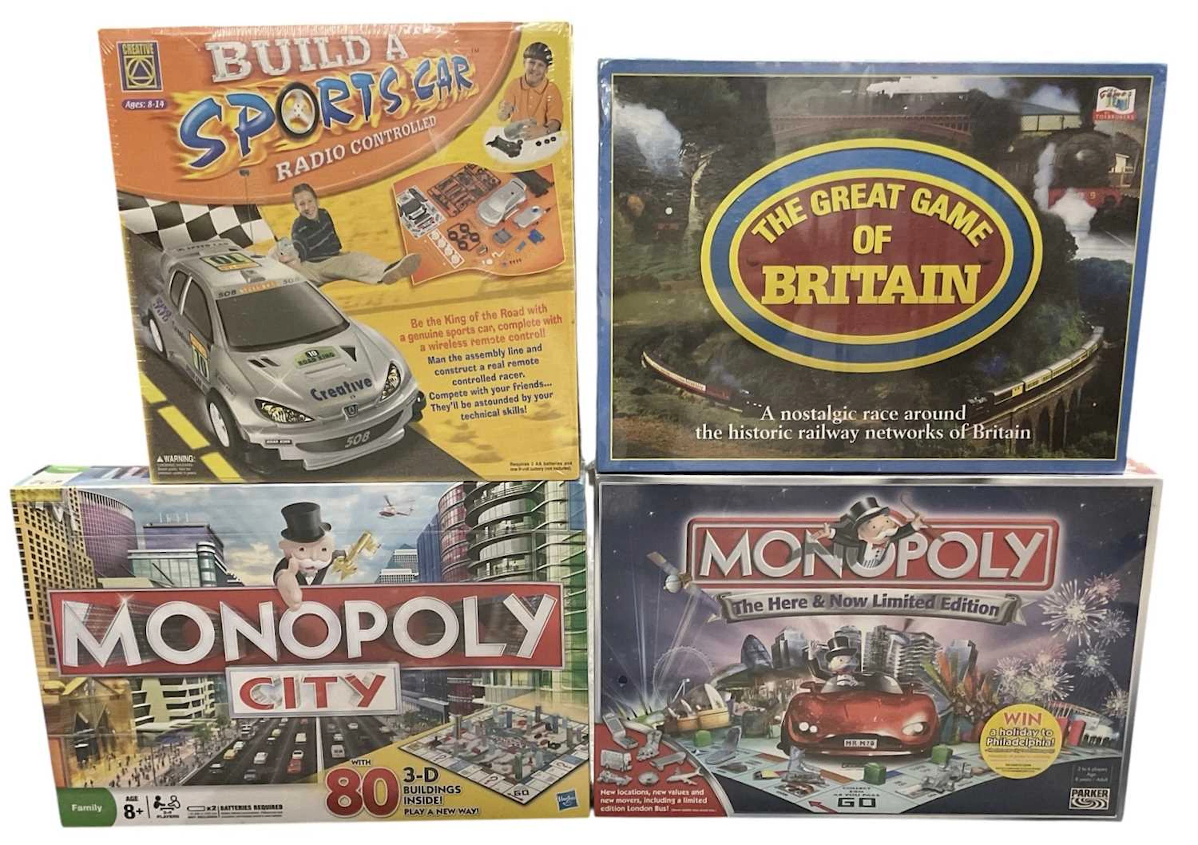 Four boxed games and toys comprising 'Build a Sports Car