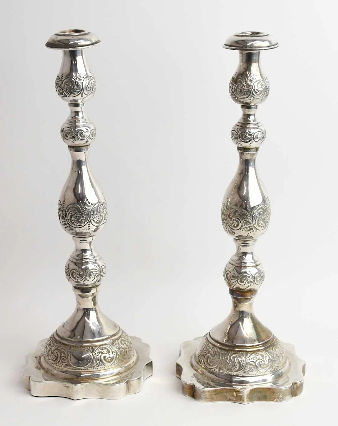 A pair of George V hallmarked silver candlesticks