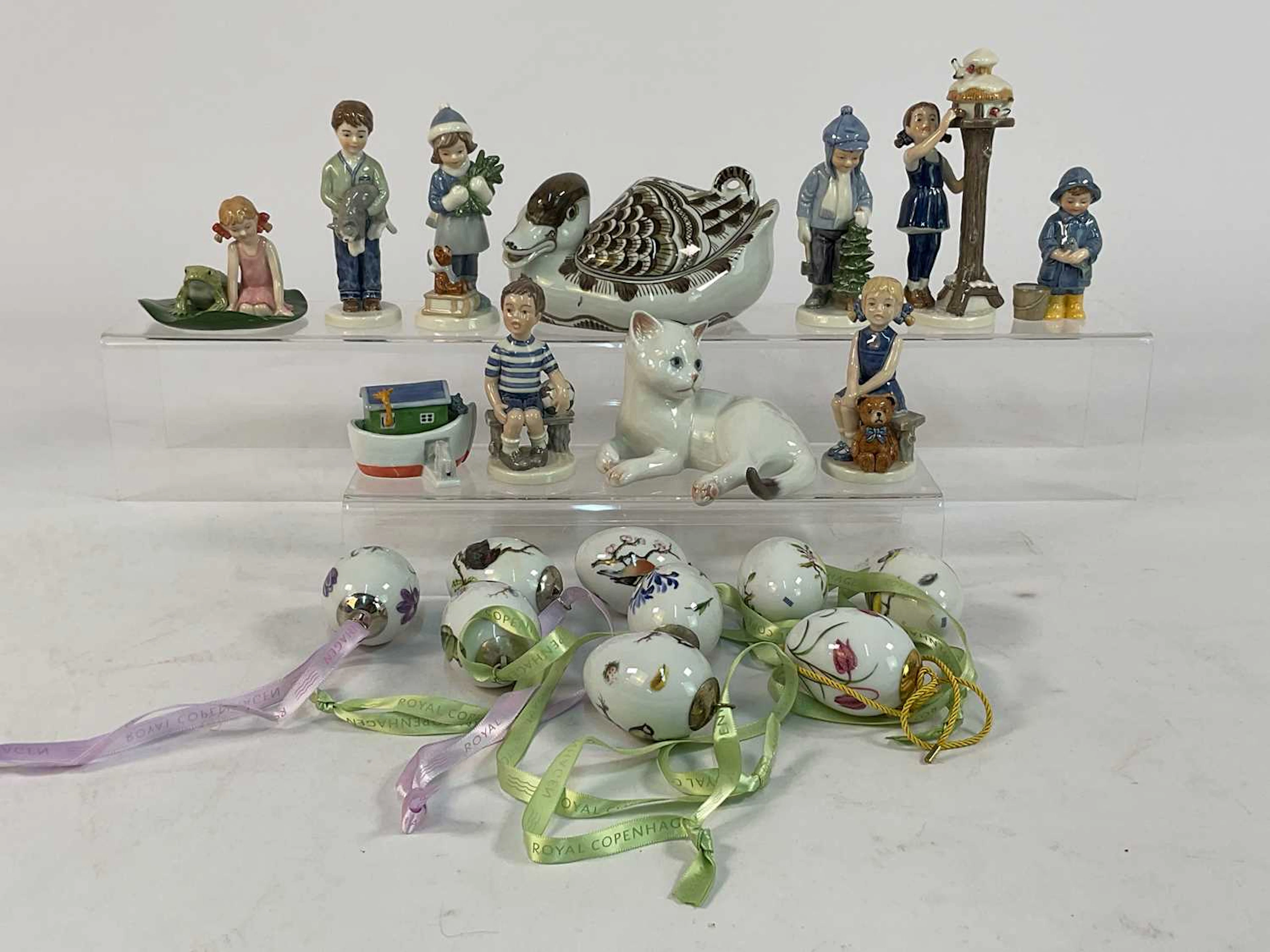 ROYAL COPENHAGEN; a quantity of porcelain figures...
