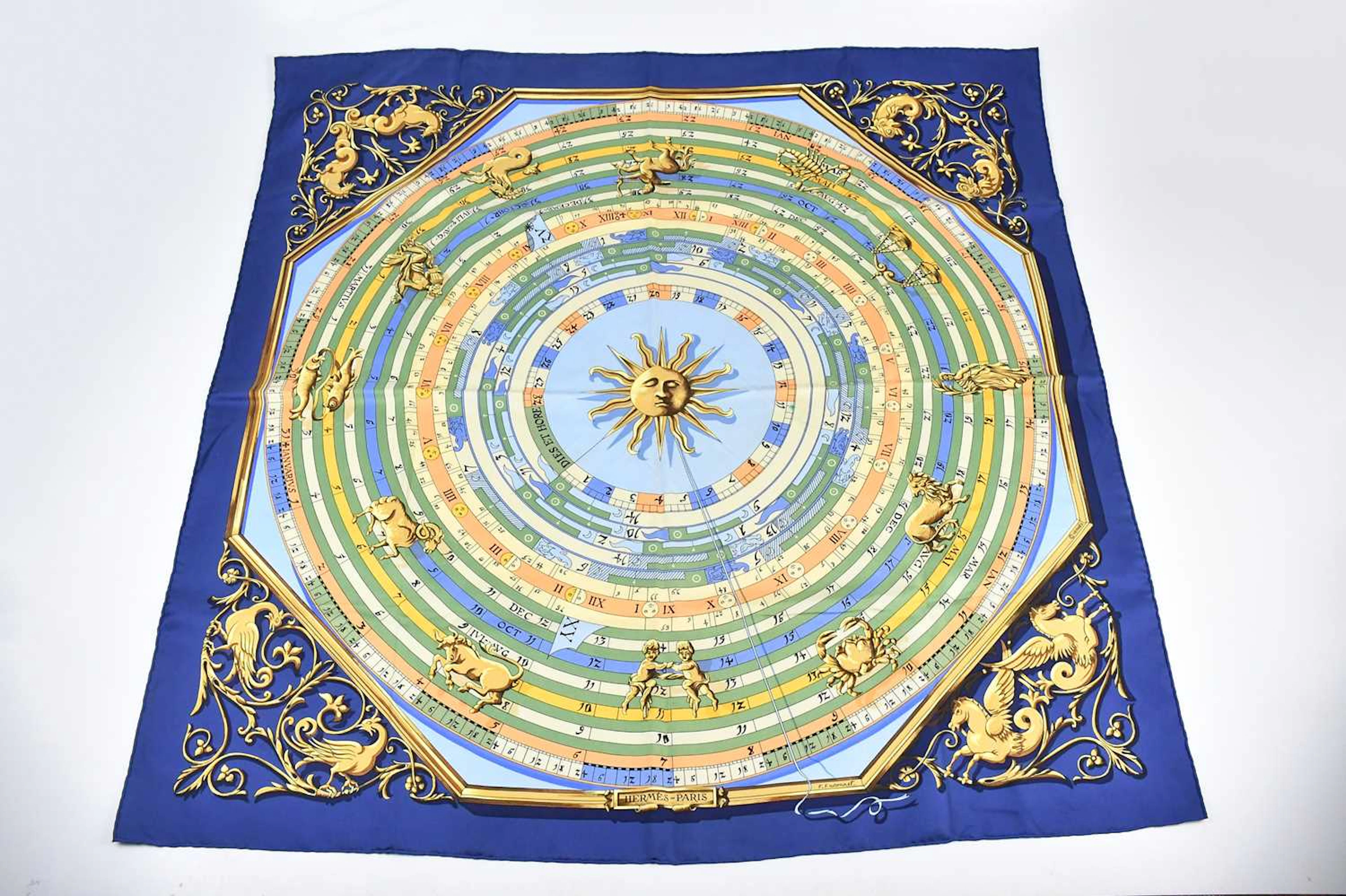 HERMÈS; a 100% twill silk blue
