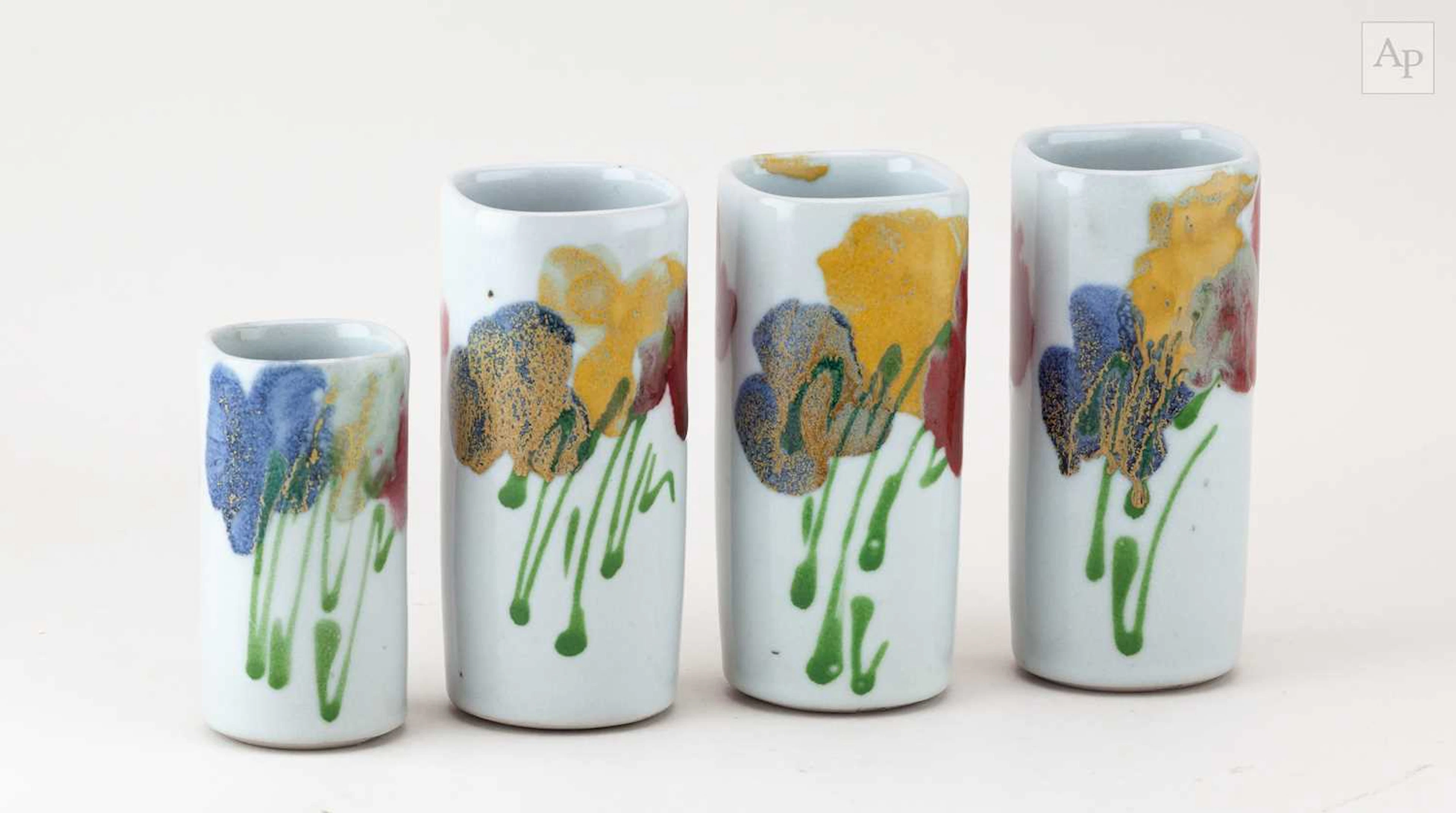 Dartington Pottery; a trio of square stoneware vases...