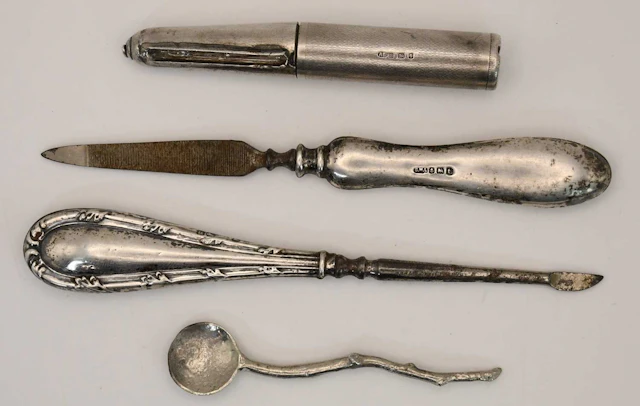 A George V hallmarked silver handled nail file