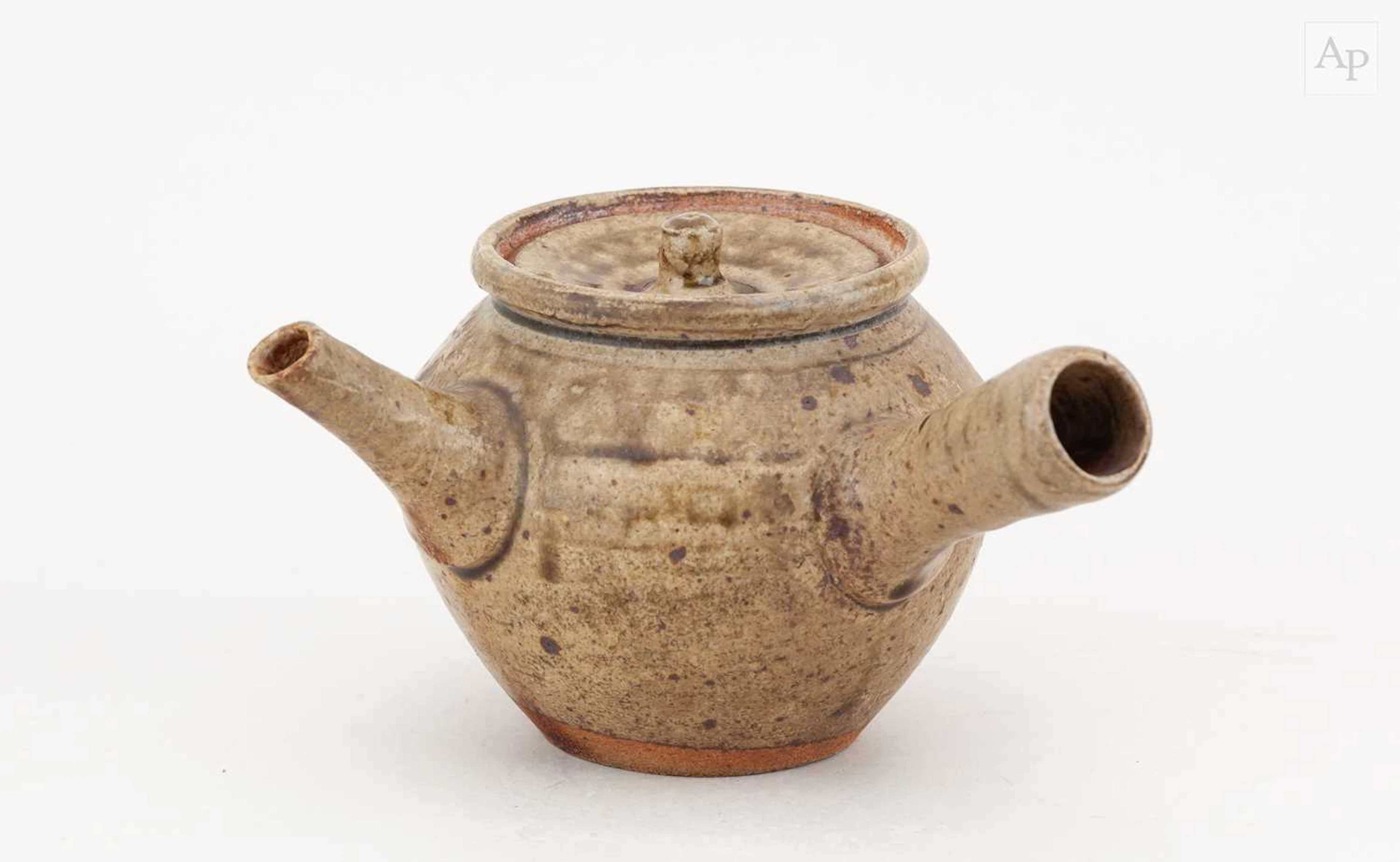 SHOJI HAMADA (1894-1978); a small stoneware teapot...
