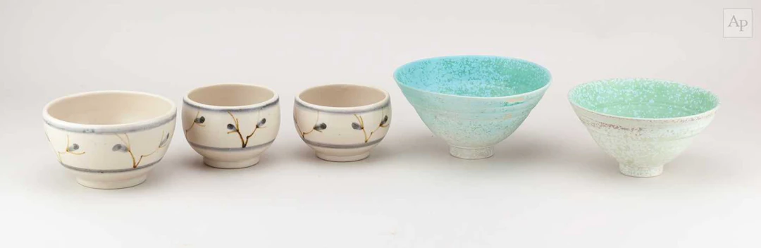 JOHN HOBSON; a pair of conical porcelain bowls covered in crystalline glaze
