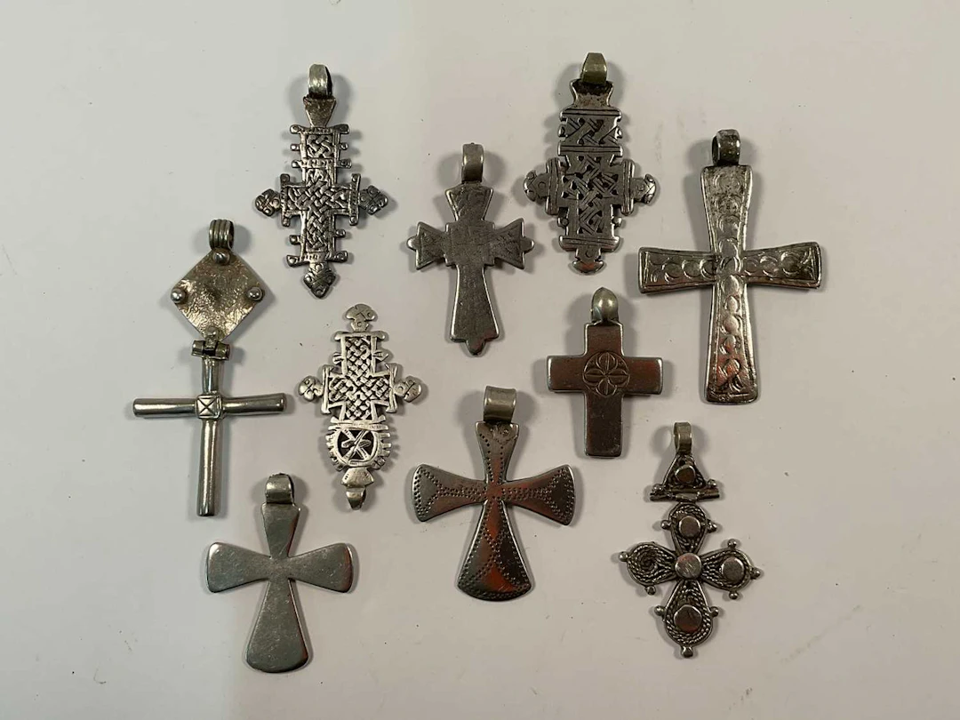 Ten Ethiopian metal Coptic crosses of various styles