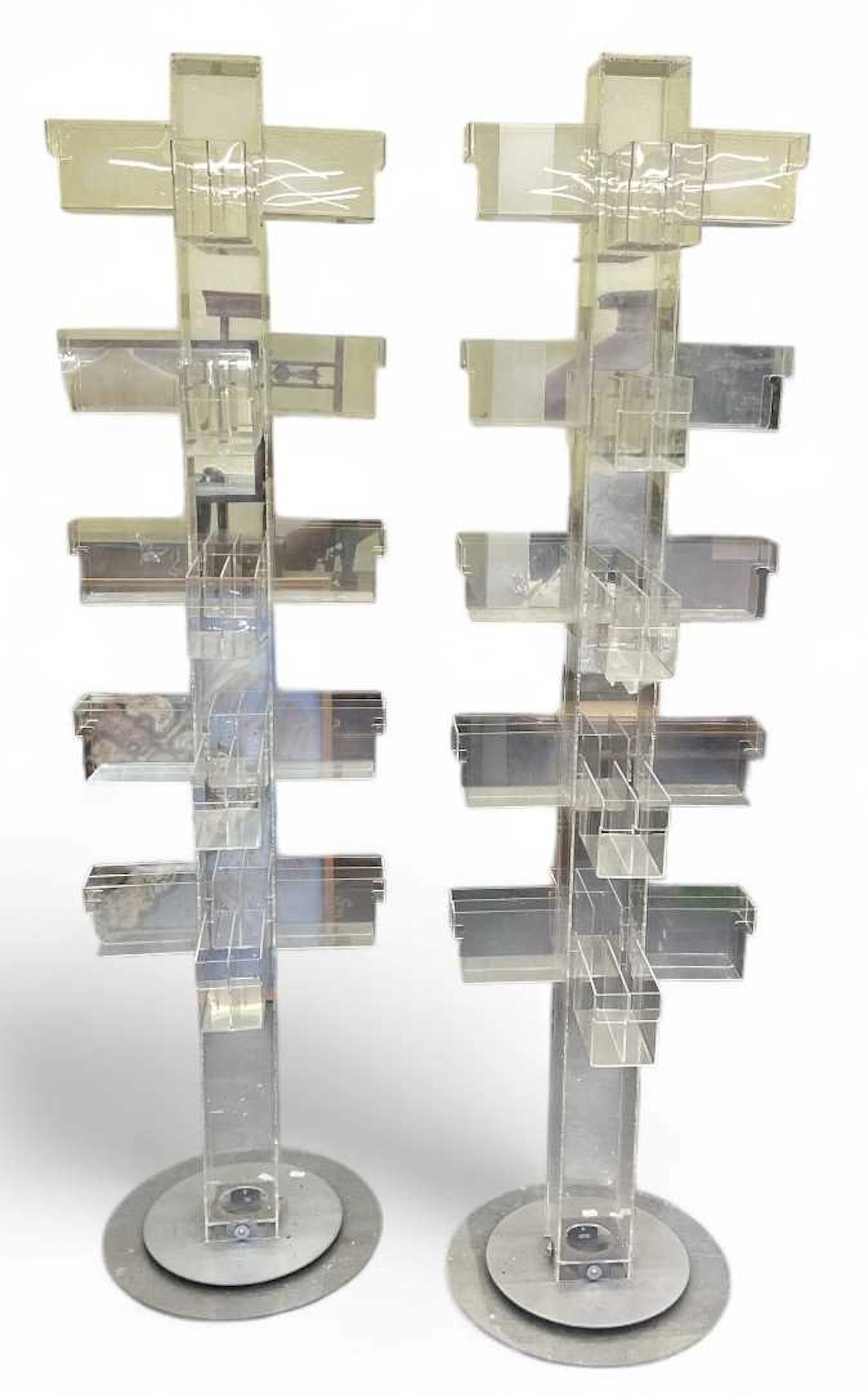 A pair of modern perspex revolving postcard shelving units