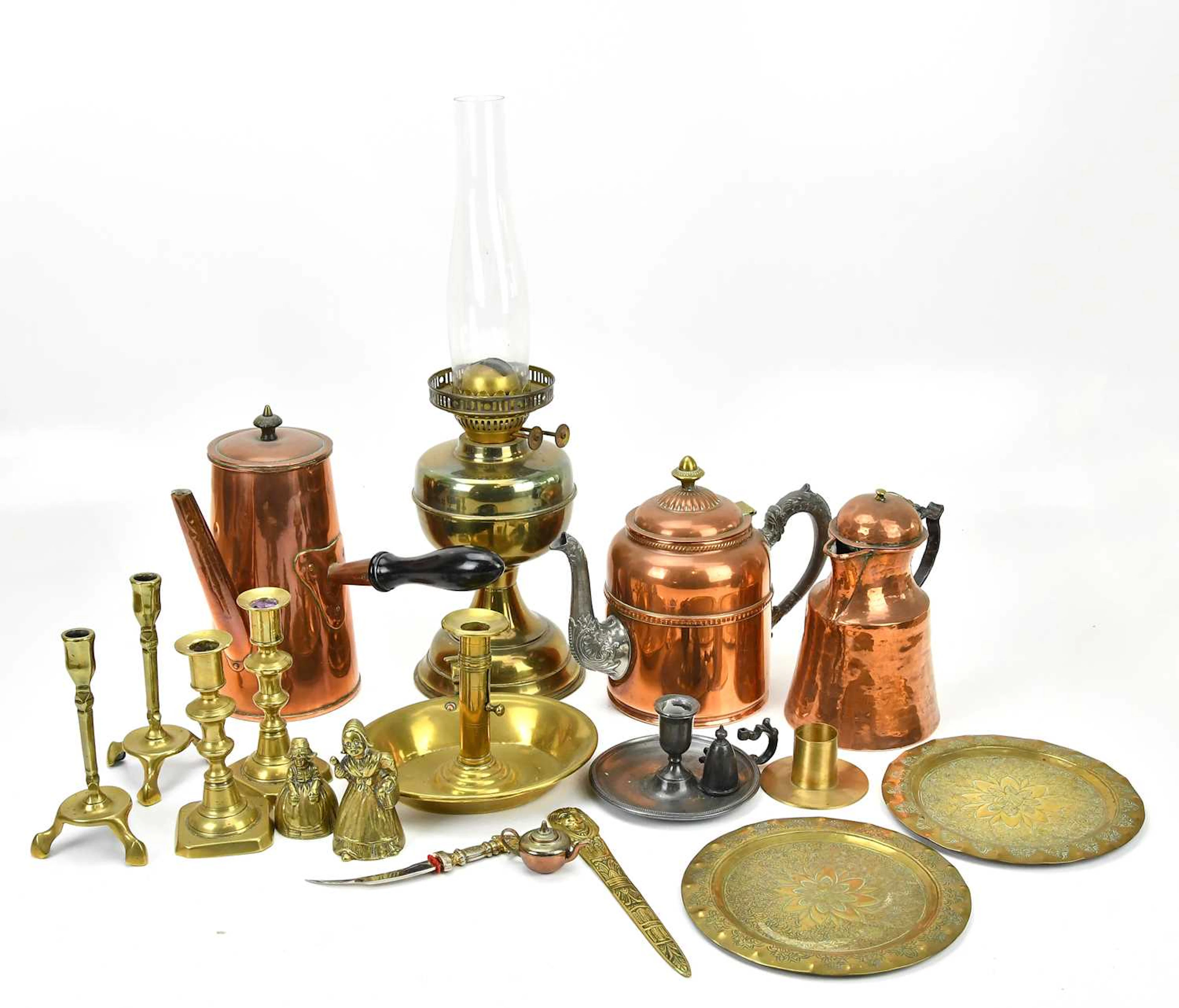 A collection of metalware including copper chocolate pot