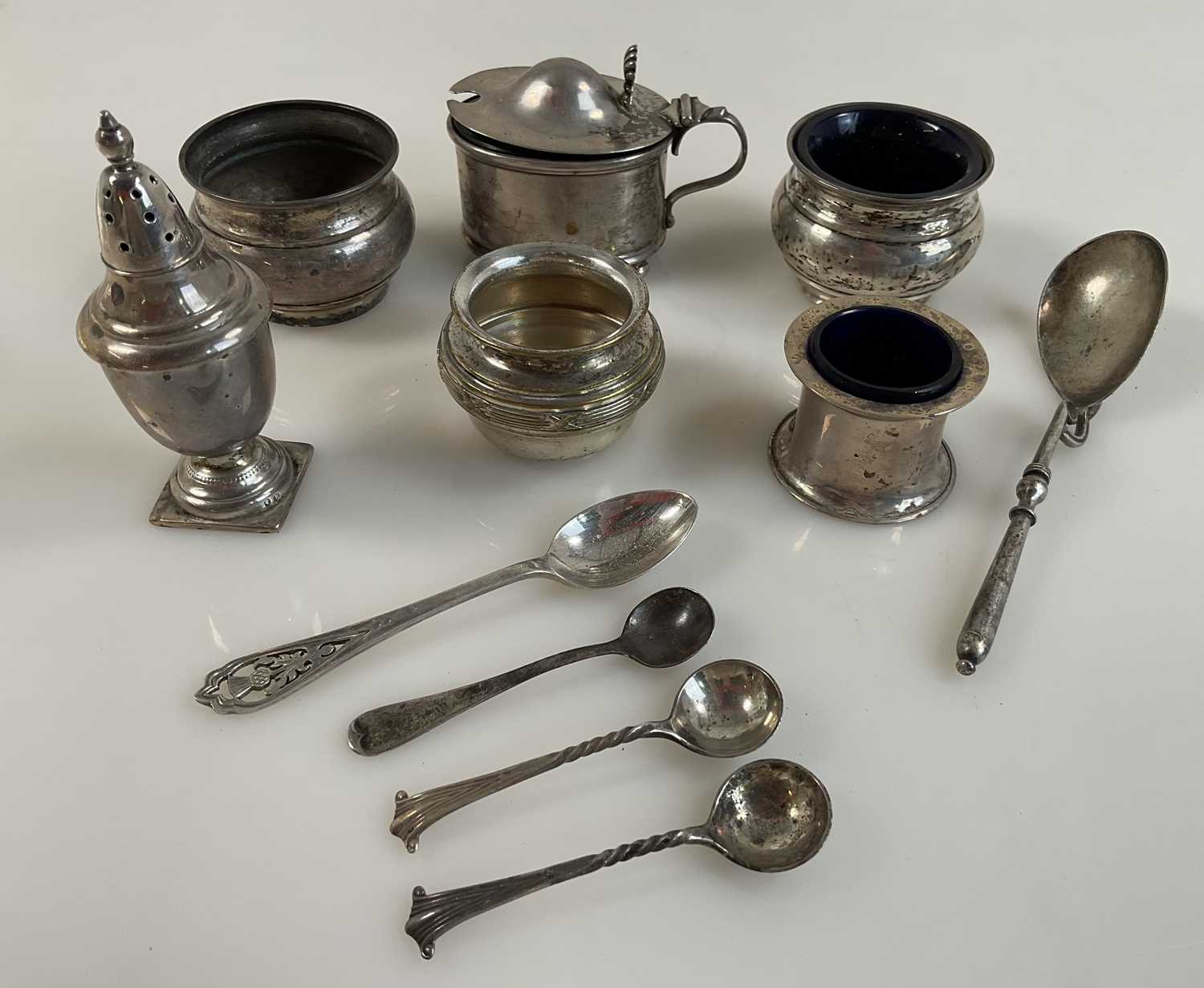 A collection of hallmarked silver to include a pair of salts