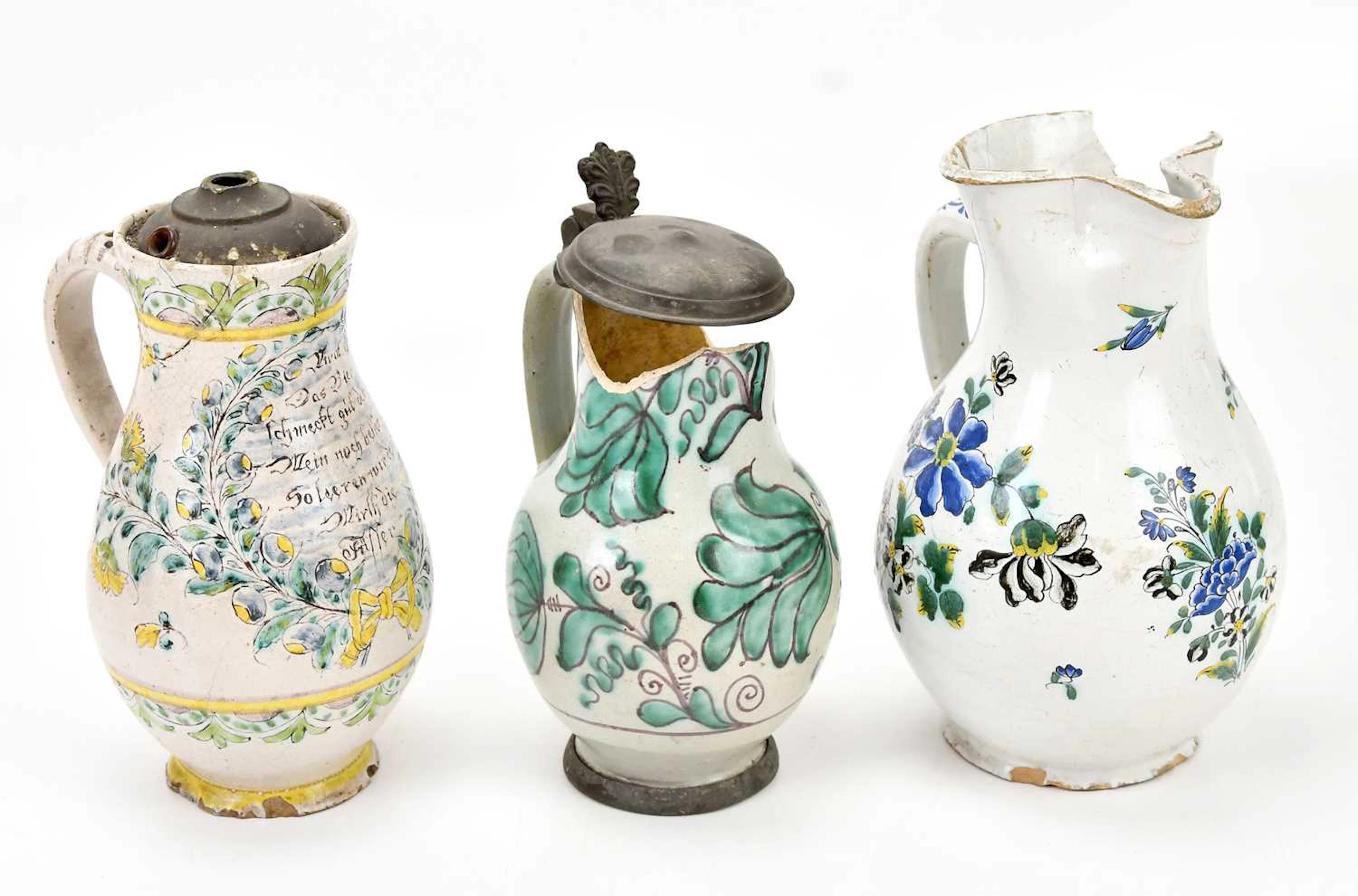A 19th century Italian faience ware vessel with pewter top