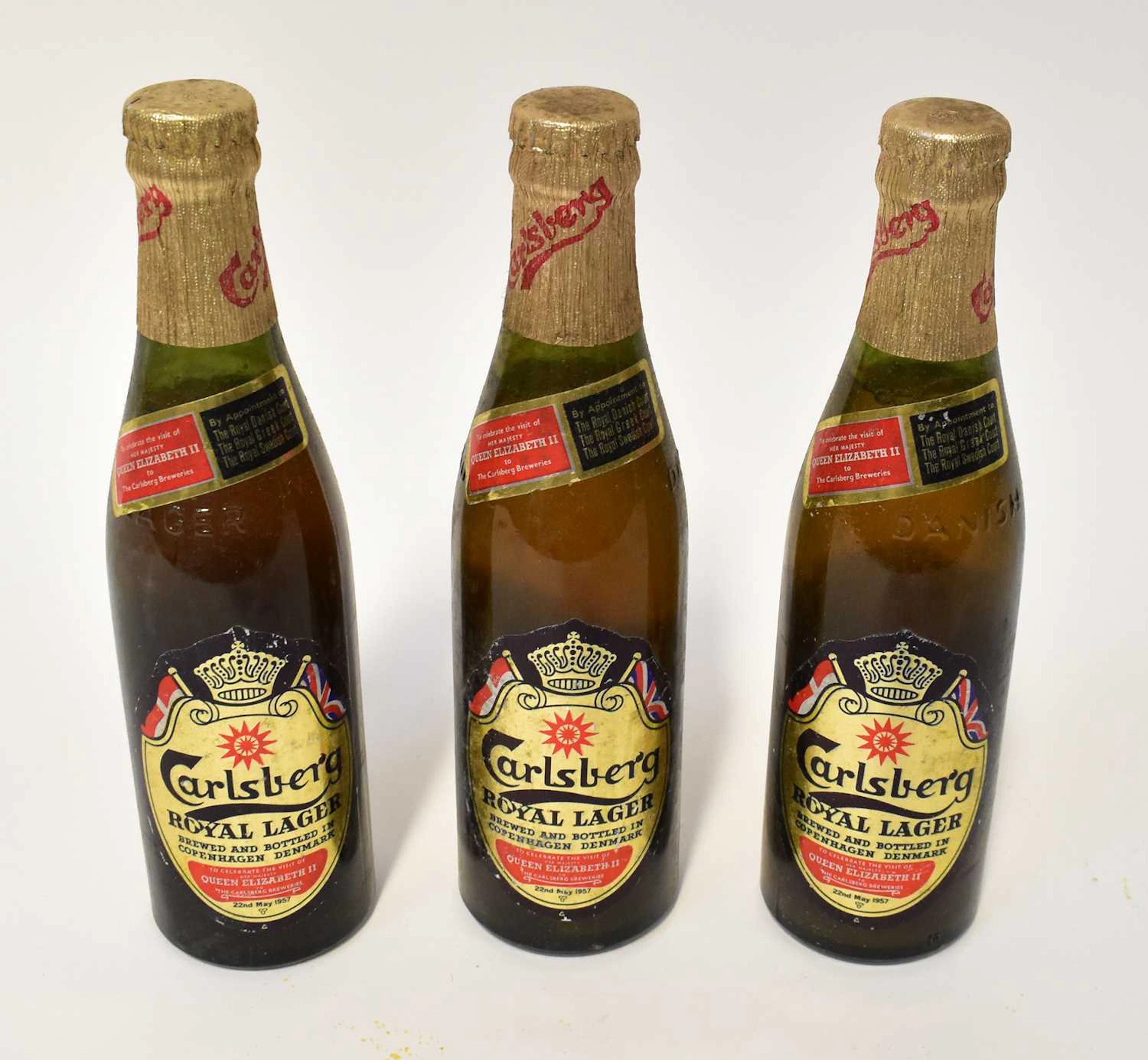 A Carlsberg Royal Lager pack containing three bottles