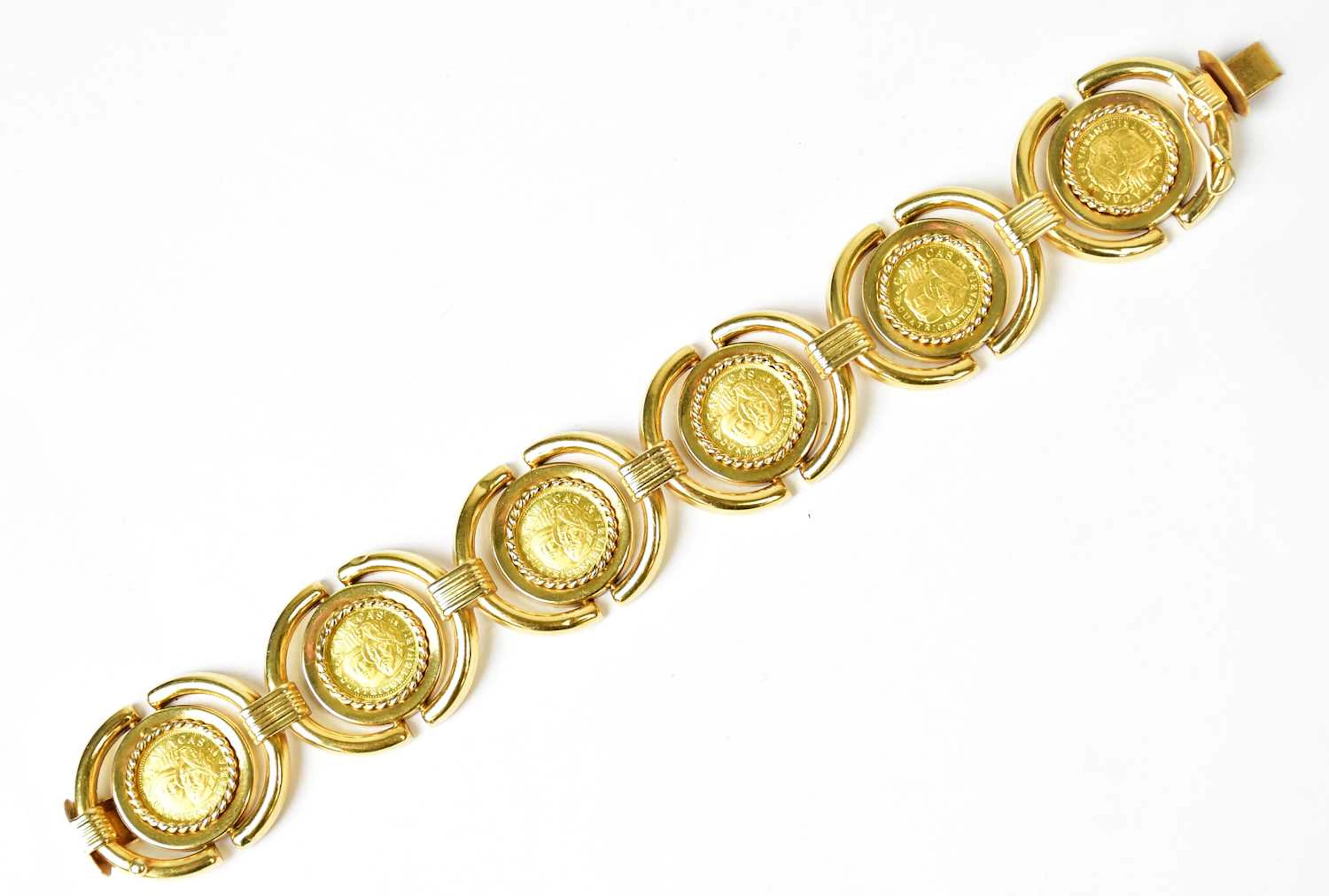 An 18ct gold bracelet set with six 21.6ct gold coins...