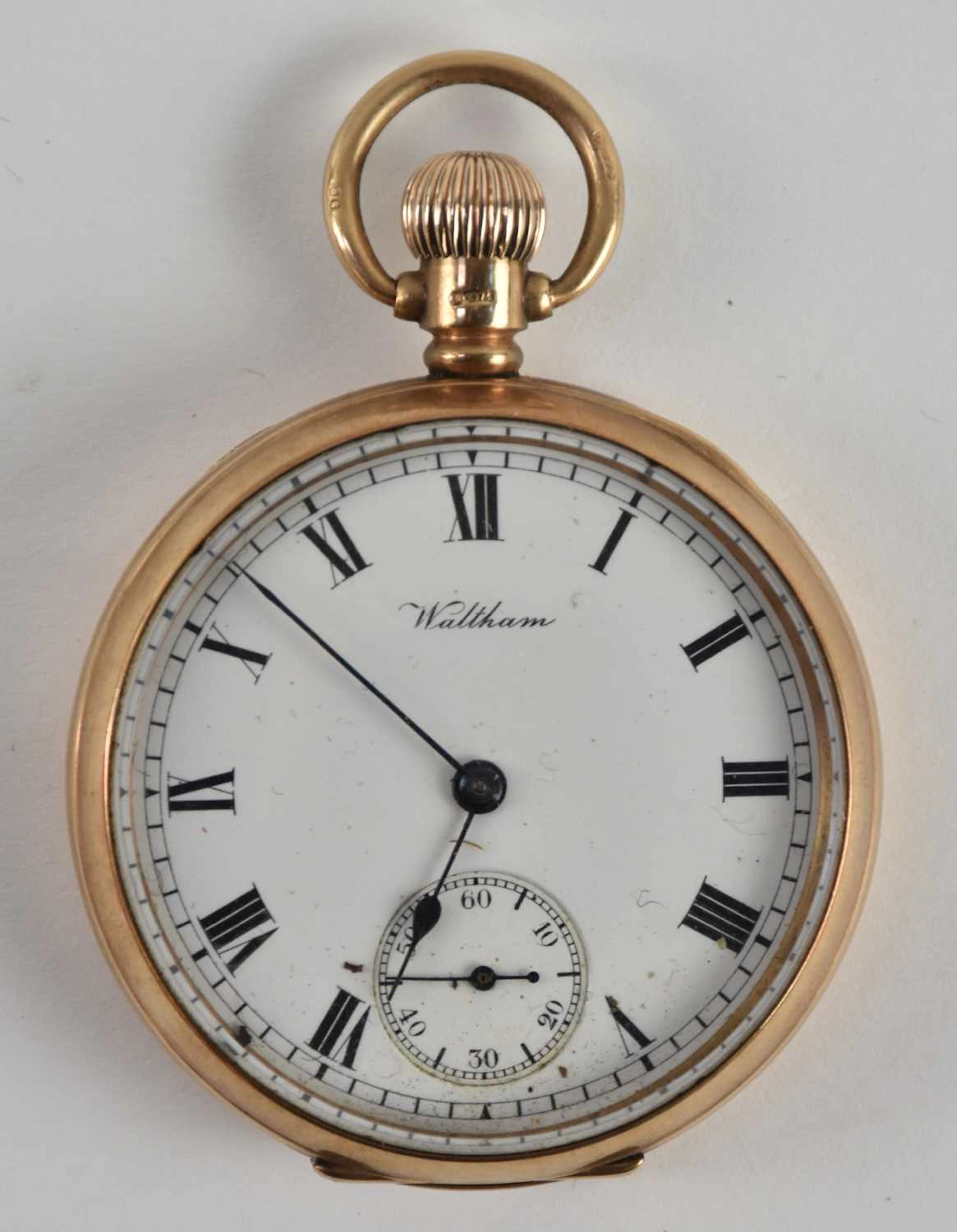 WALTHAM; a 9ct yellow gold cased open face pocket watch