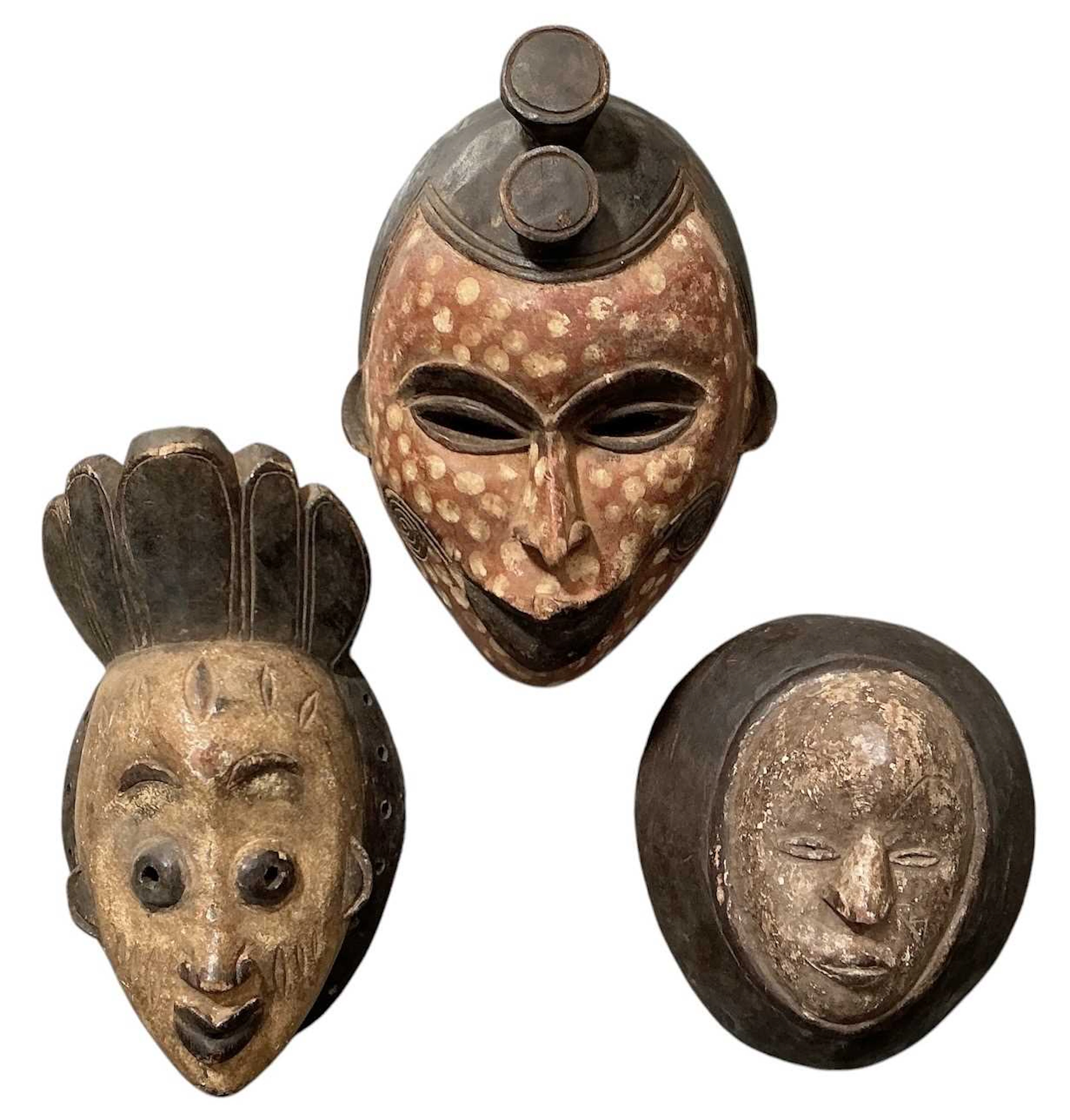 Three African tribal carved wooden masks