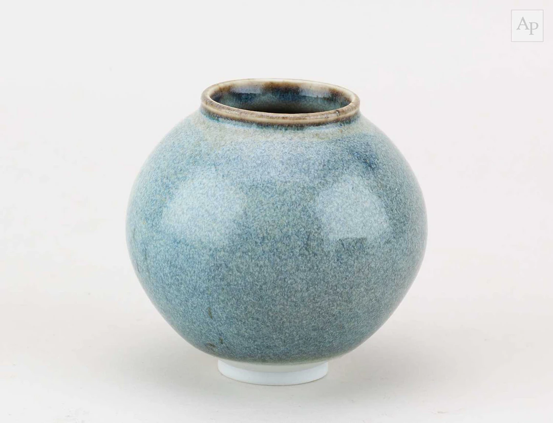 ADAM BUICK (born 1978); a mini porcelain moon jar covered...