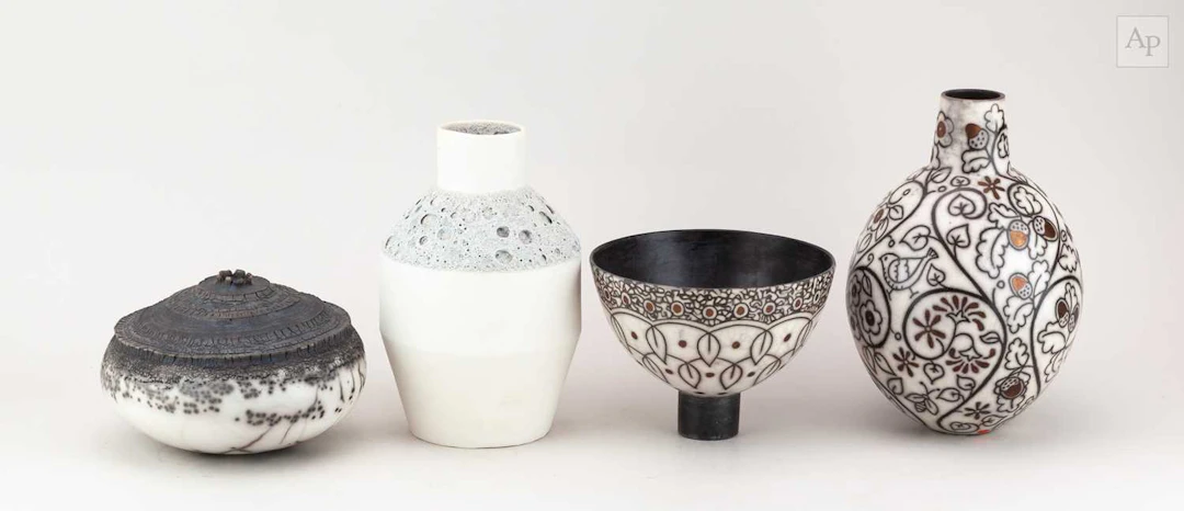DEBBIE BARBER; a smoke fired raku bottle