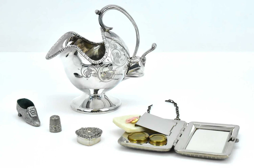 A group of various silver and silver plate comprising a...