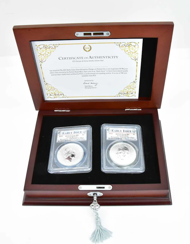 DANBURY MINT; two early issue UK silver Britannia crowns with £2 denomination