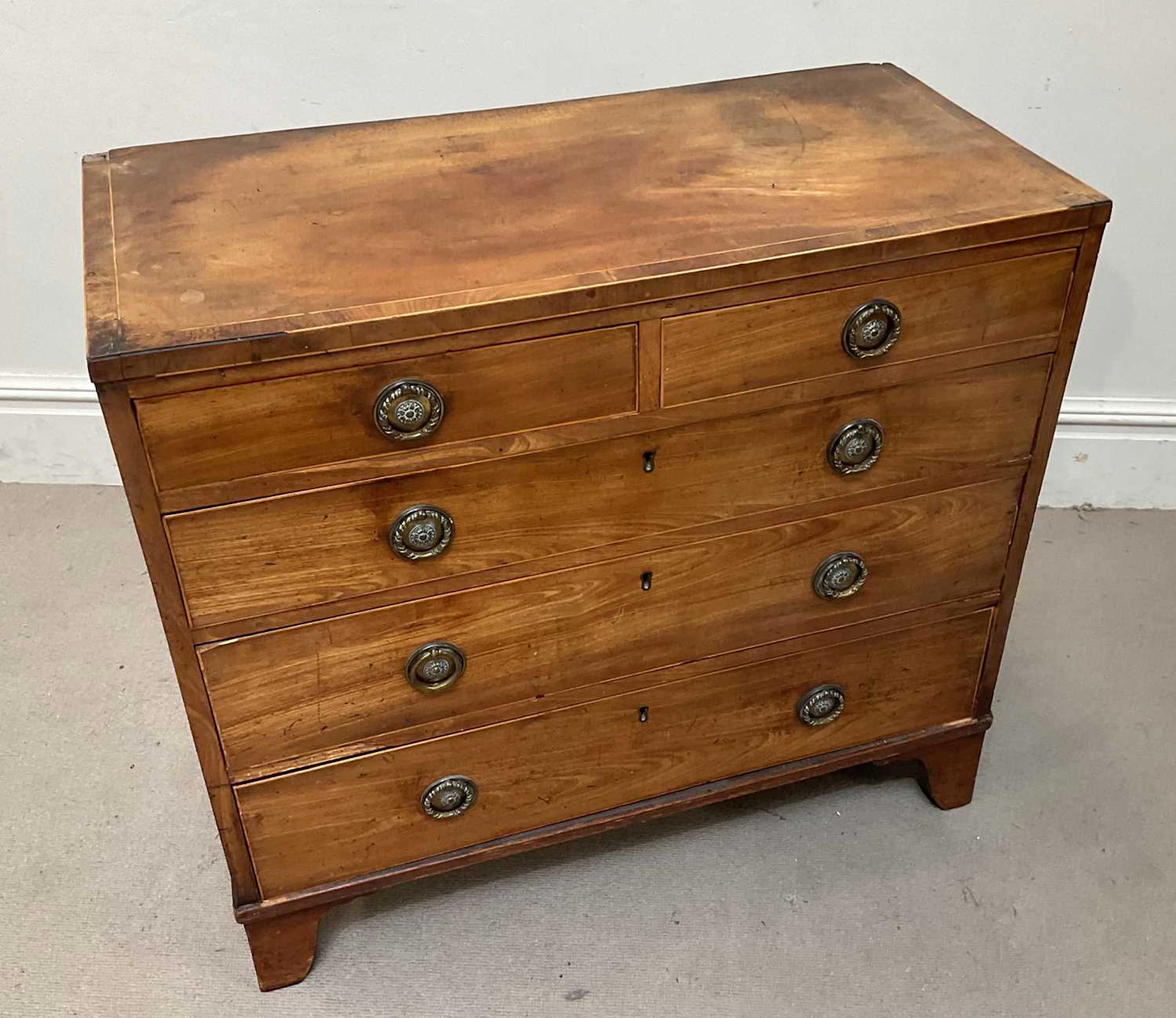 An early 19th century mahogany chest