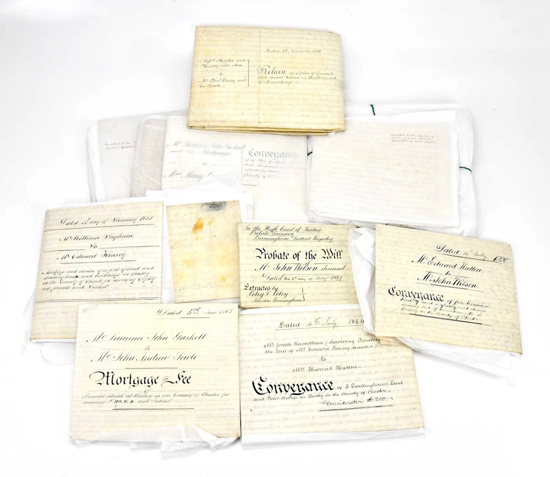 A collection of twelve early 19th century indentures and documents