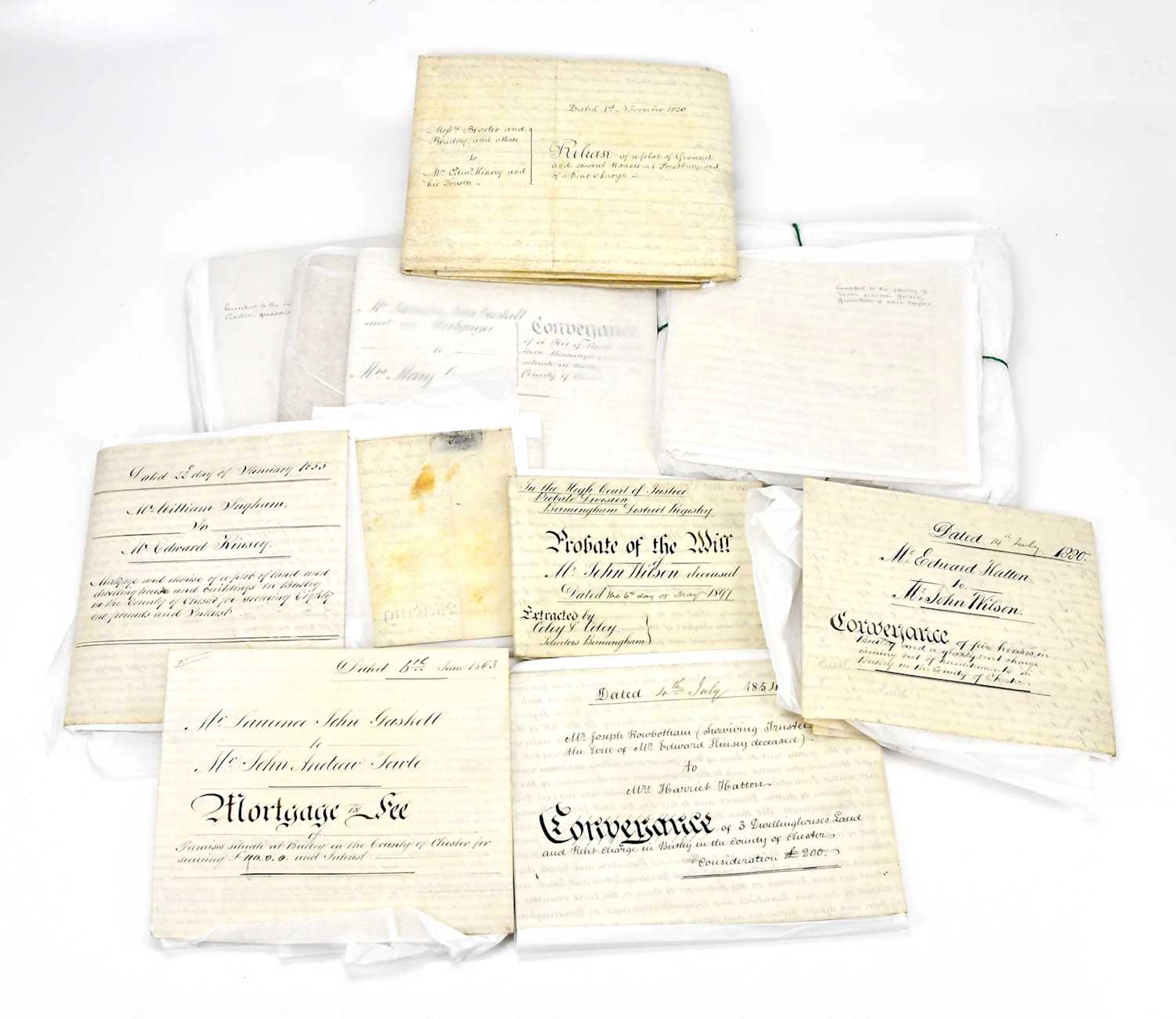 A collection of twelve early 19th century indentures and documents